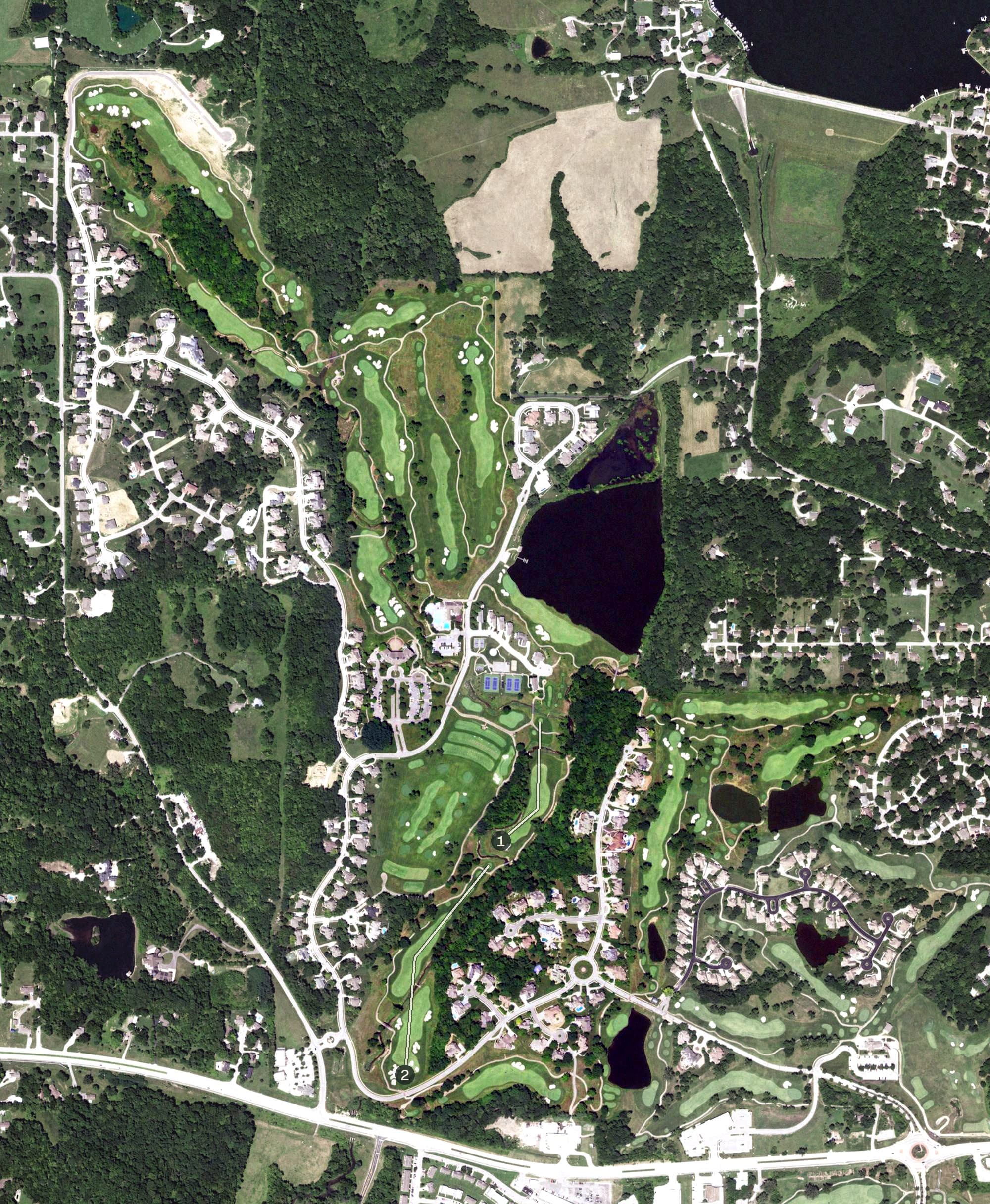 Aerial view of The National Golf Club, MO, with its hole routing marked
