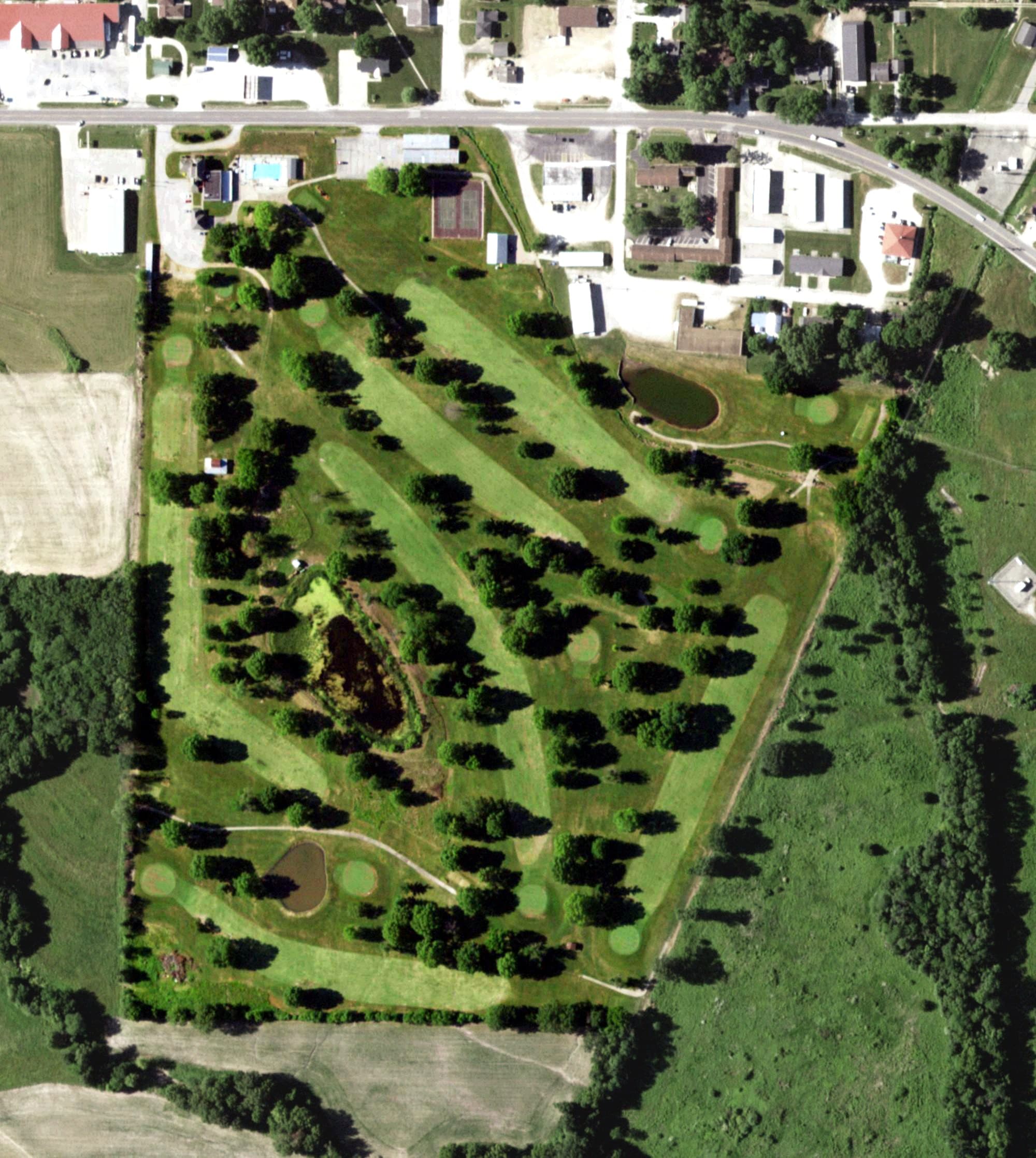 Aerial view of Tipton Country Club, MO, with its hole routing marked