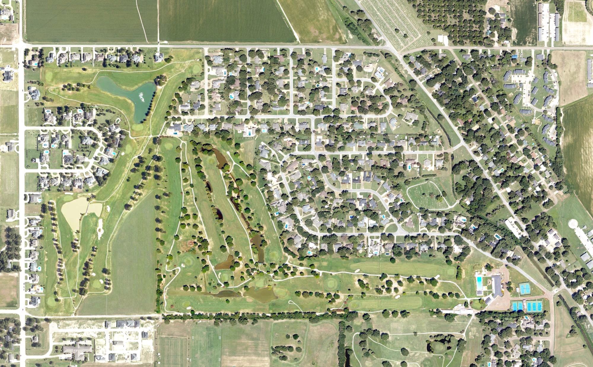 Aerial view of Cleveland Country Club, MS, with its hole routing marked