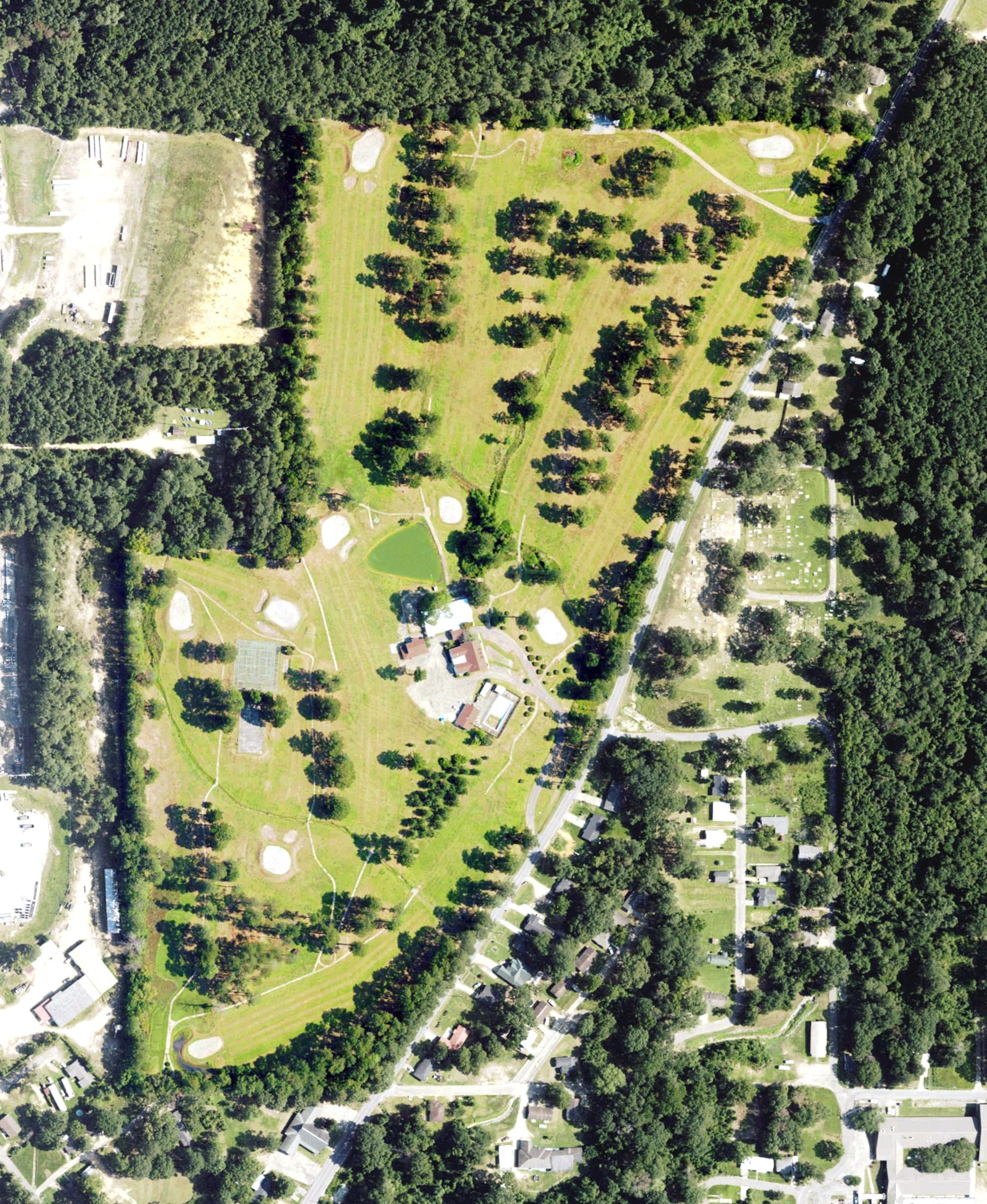 Aerial view of Country Club of Columbia, MS, with its hole routing marked