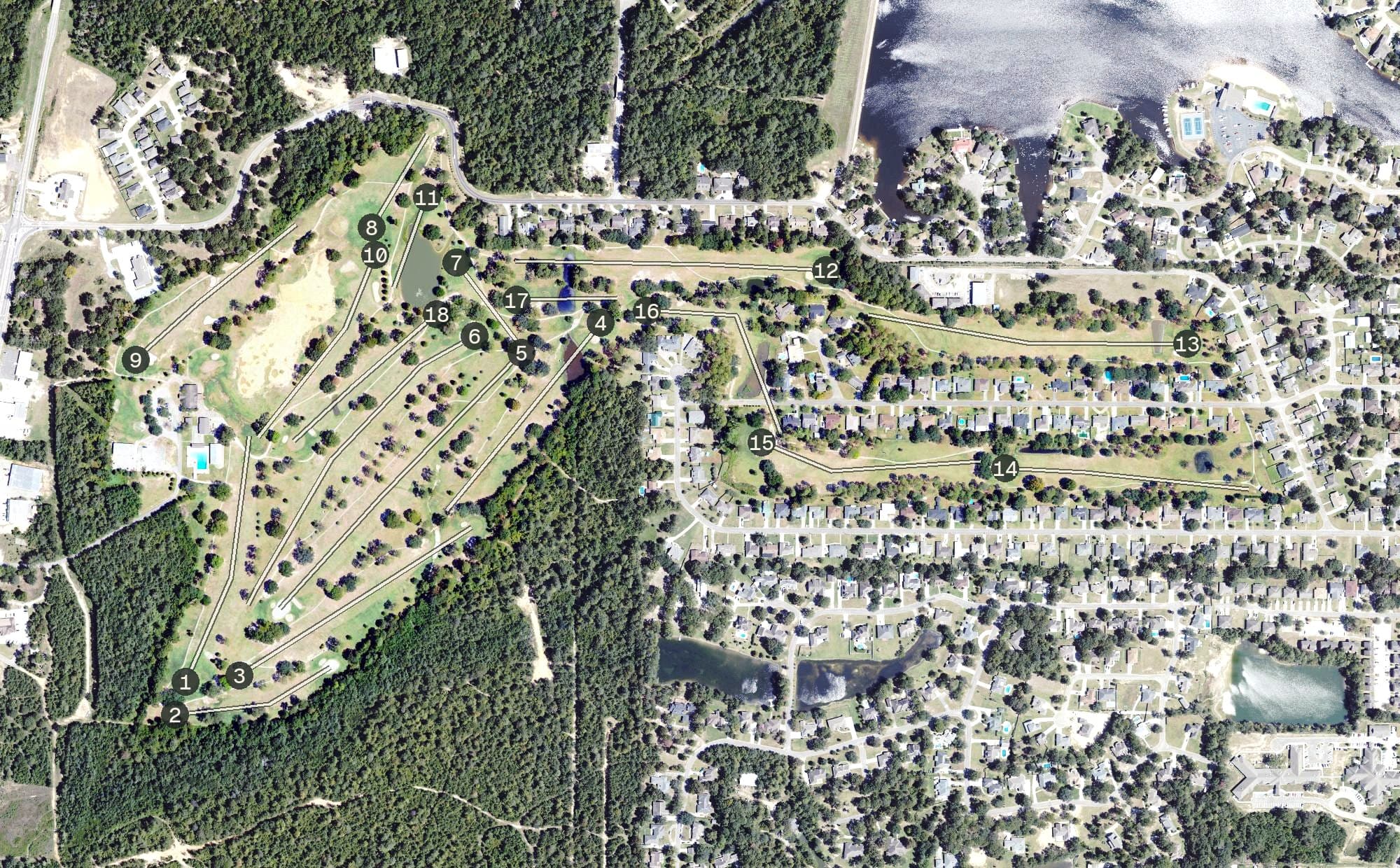 Aerial view of Millbrook Golf & Country Club, MS, with its hole routing marked