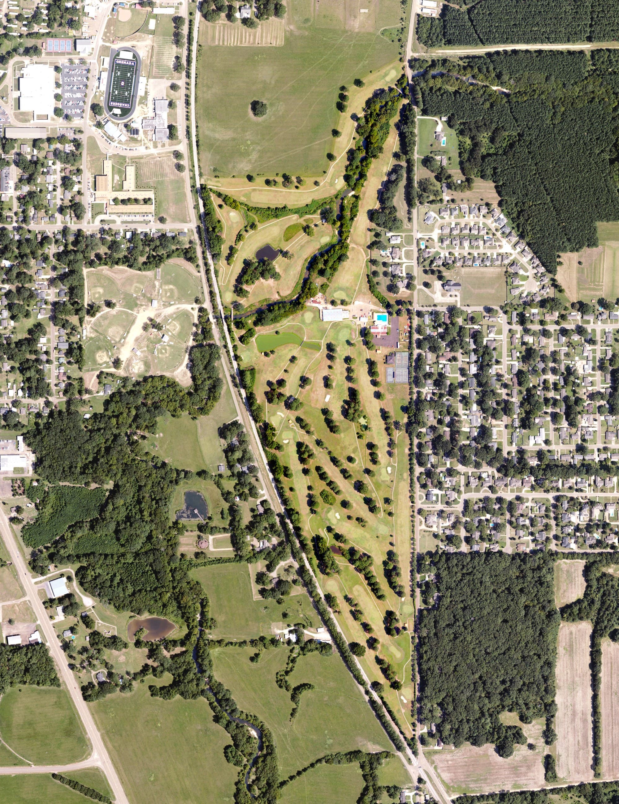 Aerial view of Perry Creek Golf & Racquet Club, MS, with its hole routing marked