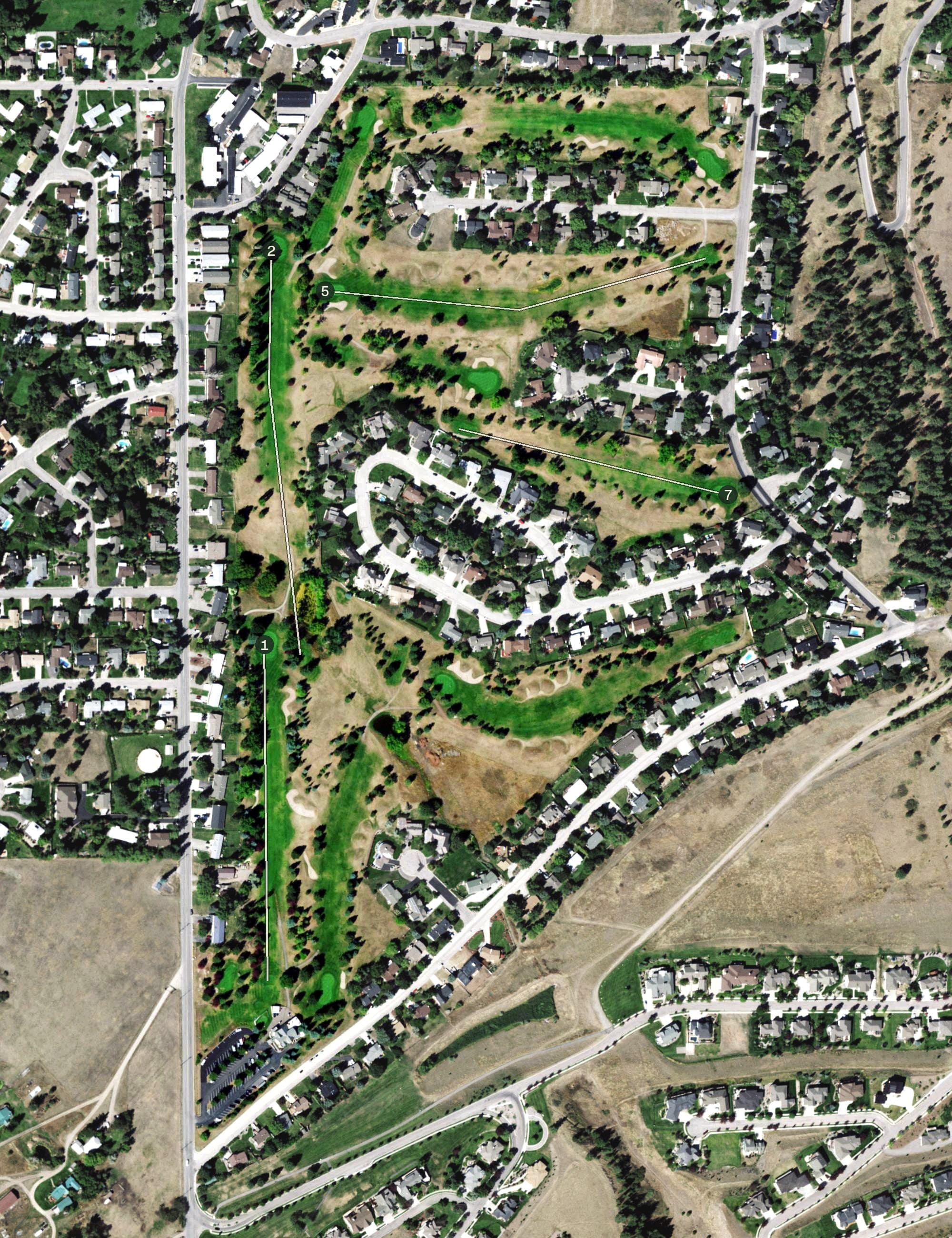 Aerial view of The Highlands Golf Club, MT, with its hole routing marked