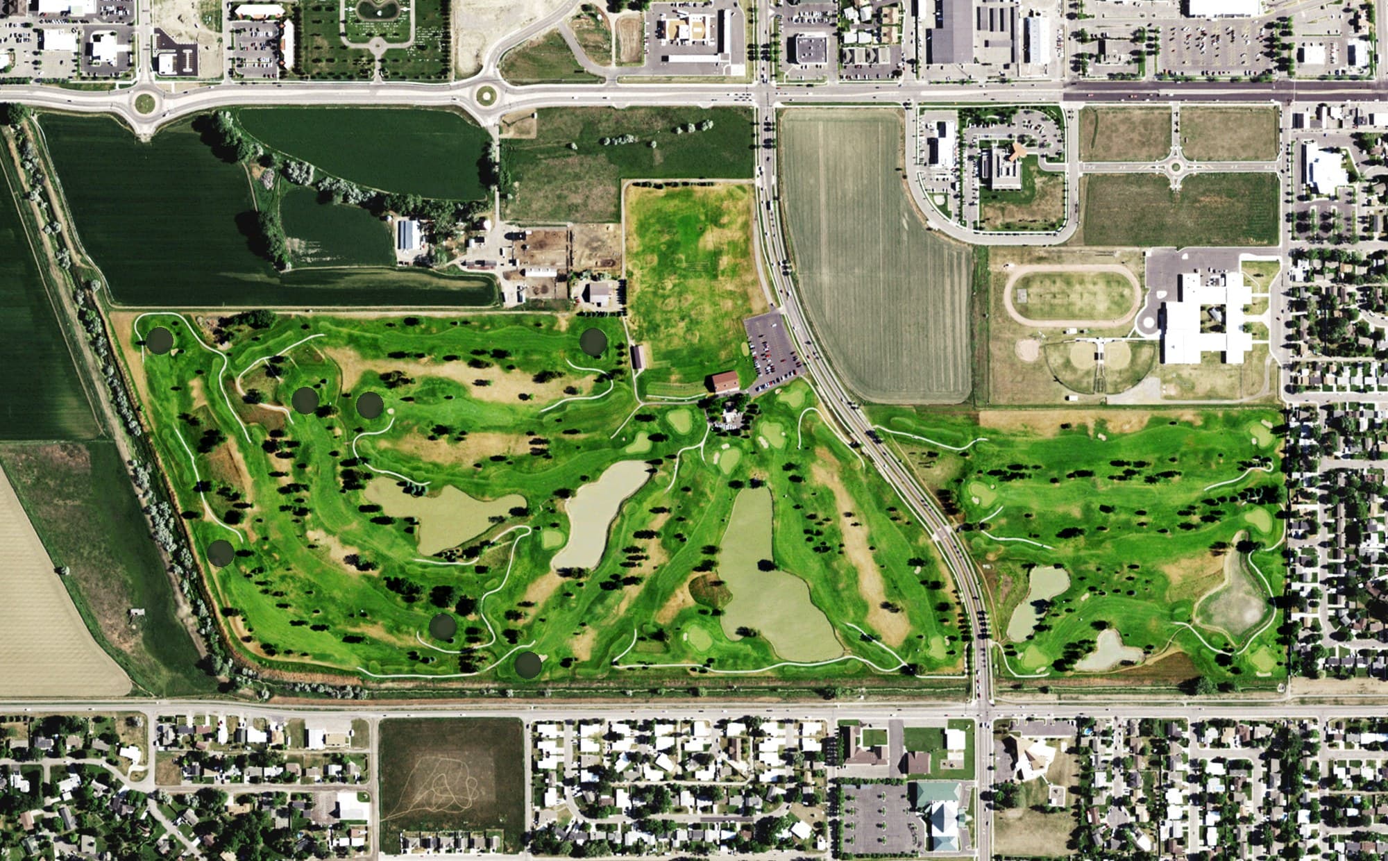 Aerial view of Yegen Golf Club, MT, with its hole routing marked