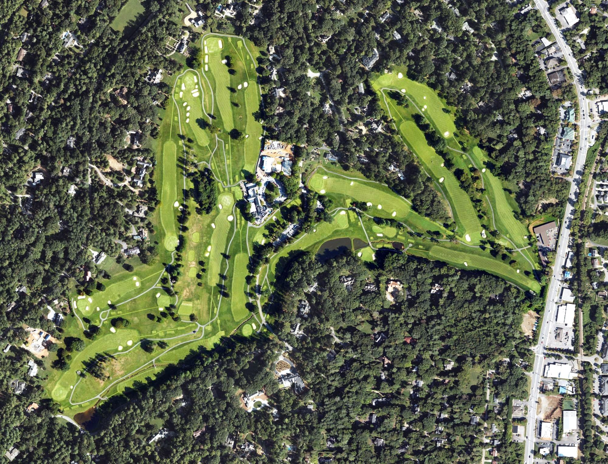 Aerial view of Biltmore Forest Country Club, NC, with its hole routing marked