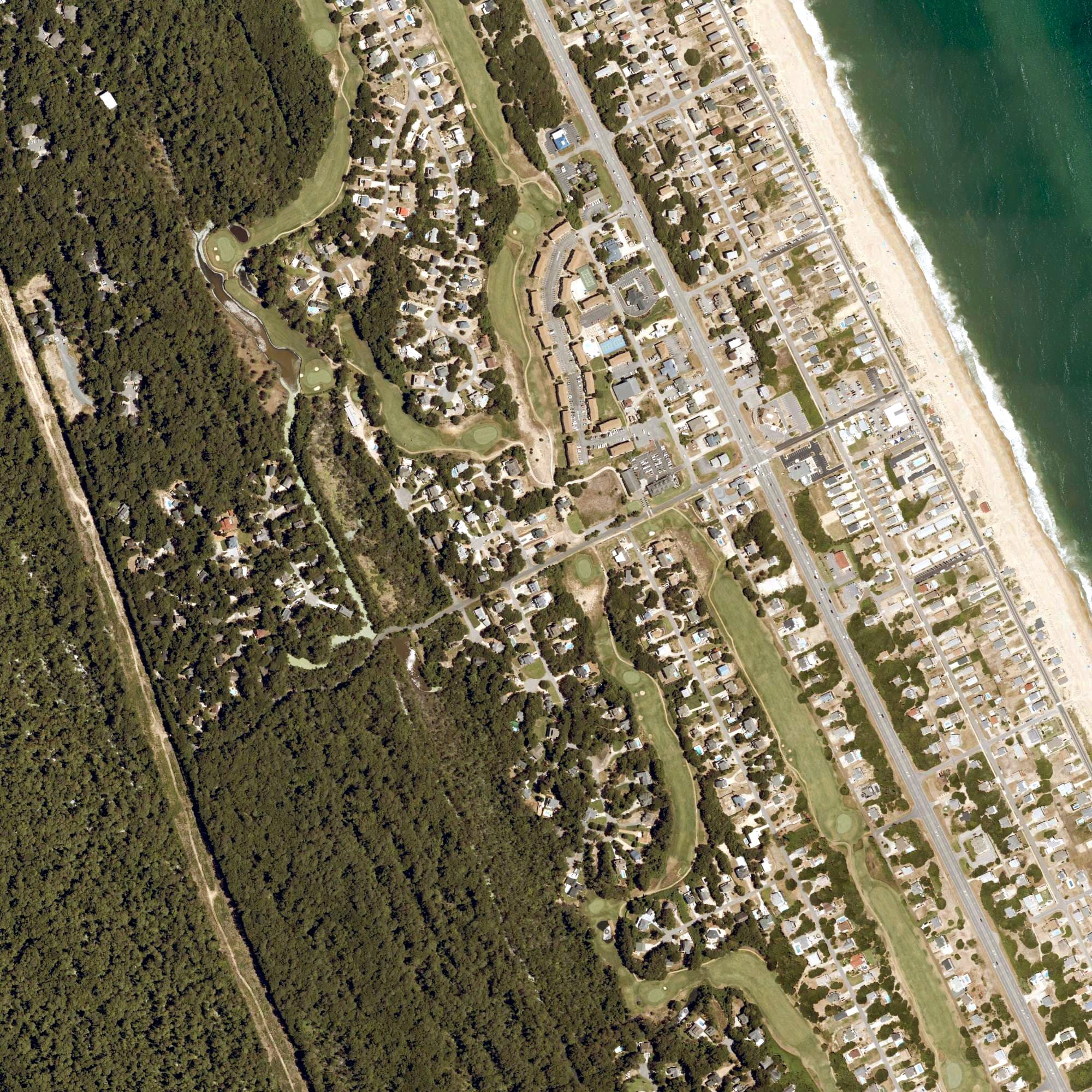 Aerial view of Sea Scape Golf Links, NC, with its hole routing marked