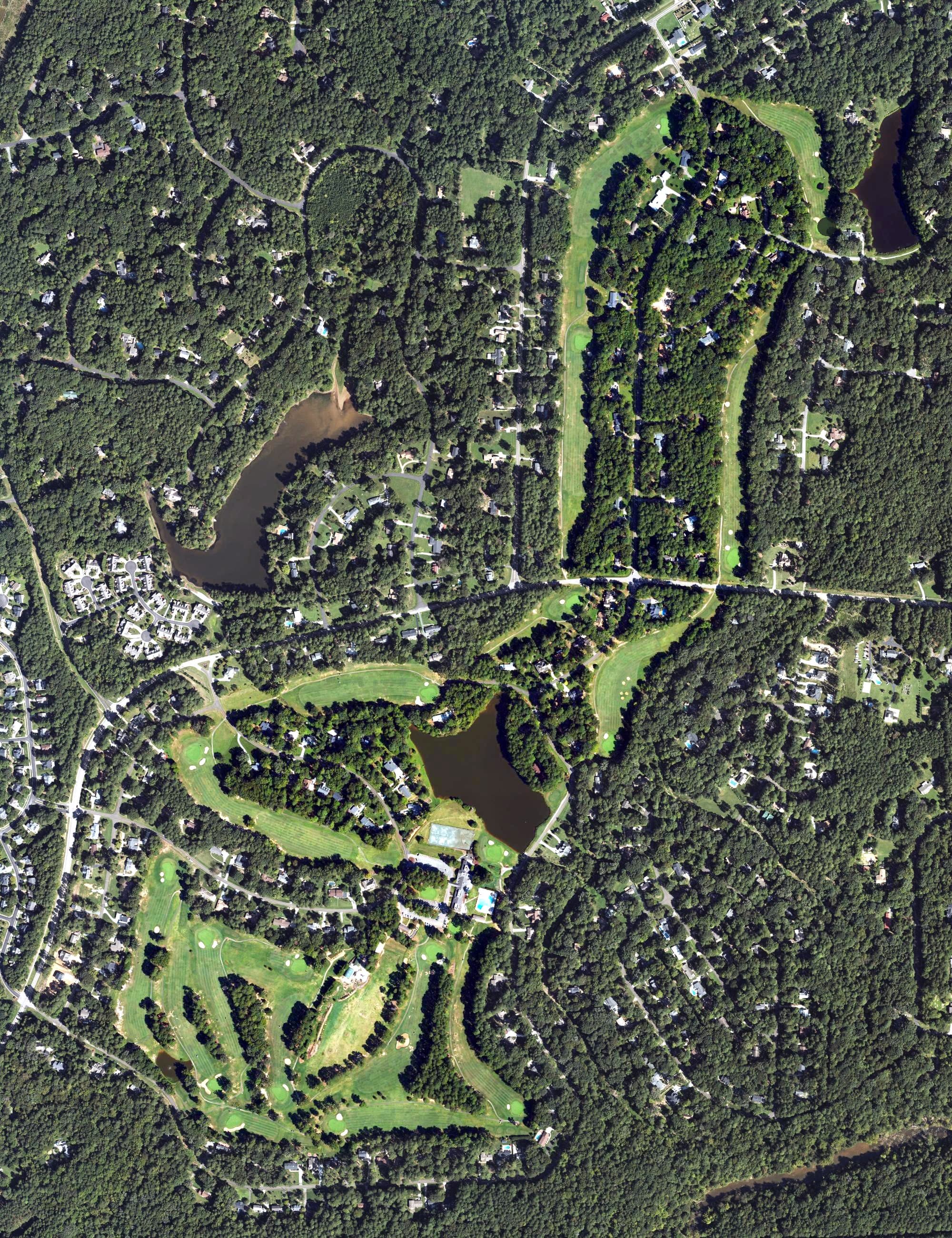 Aerial view of Umstead Pines Golf & Swim Club, NC, with its hole routing marked