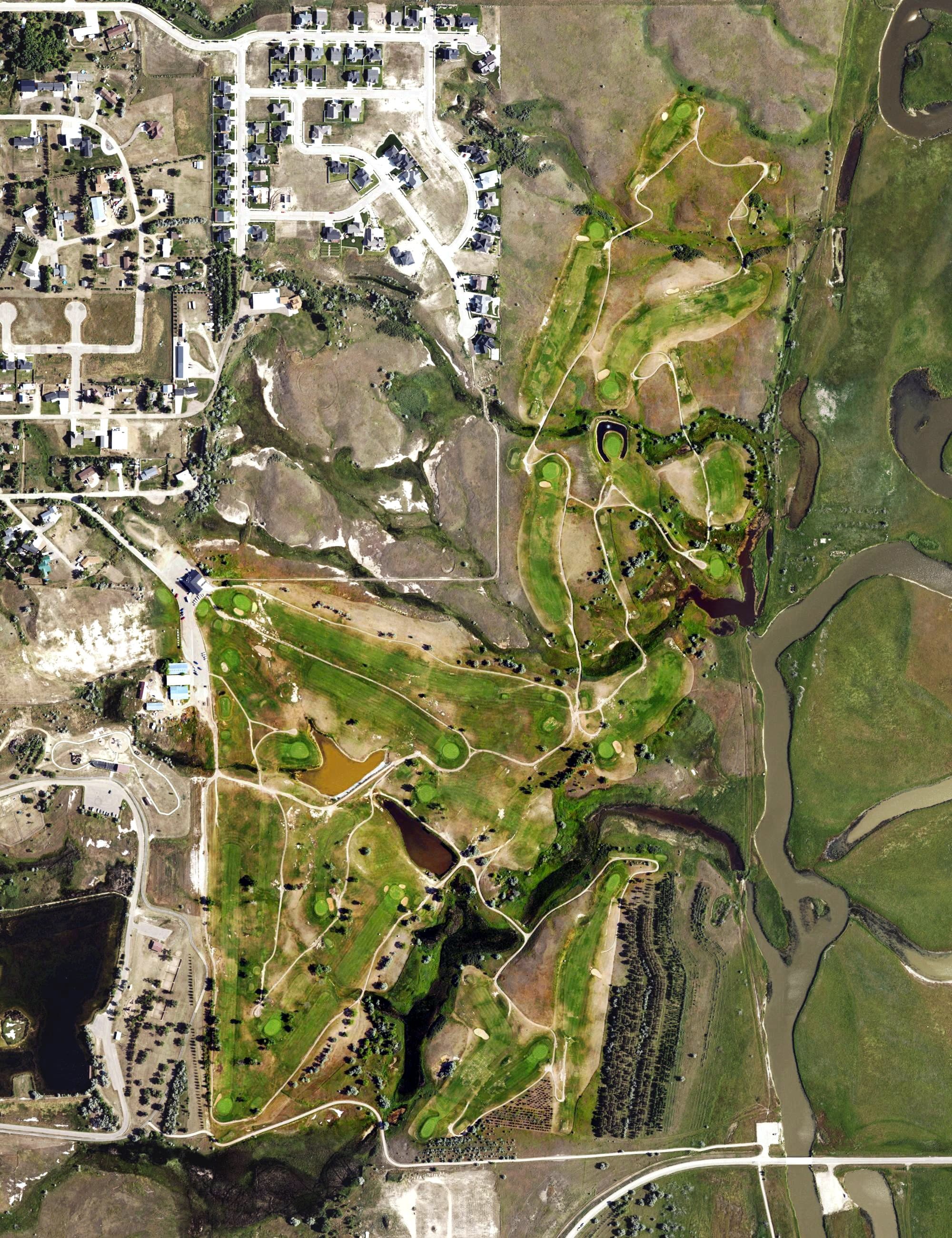 Aerial view of Eagle Ridge Golf Club, ND, with its hole routing marked