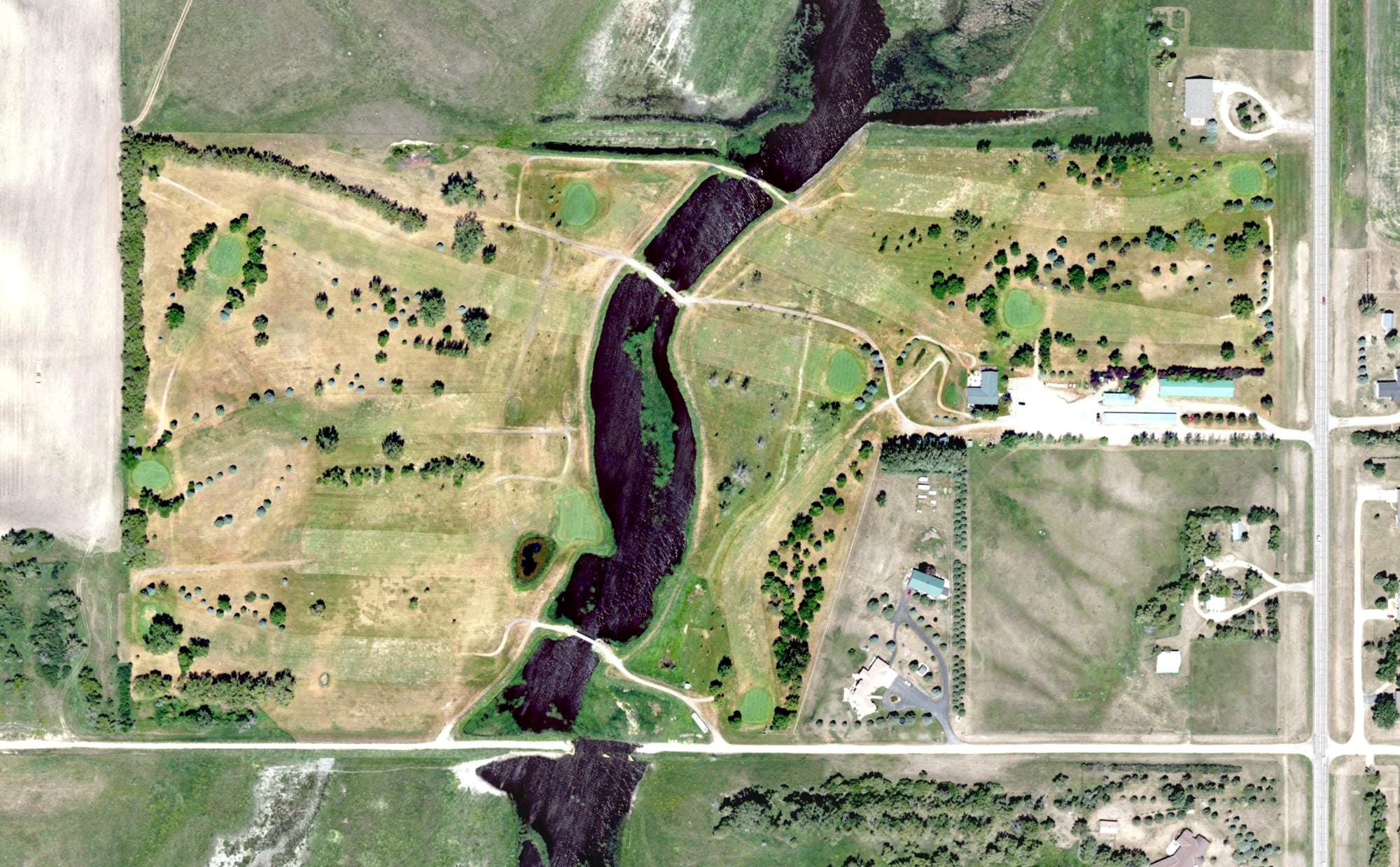 Aerial view of Oakes Golf Club, ND, with its hole routing marked