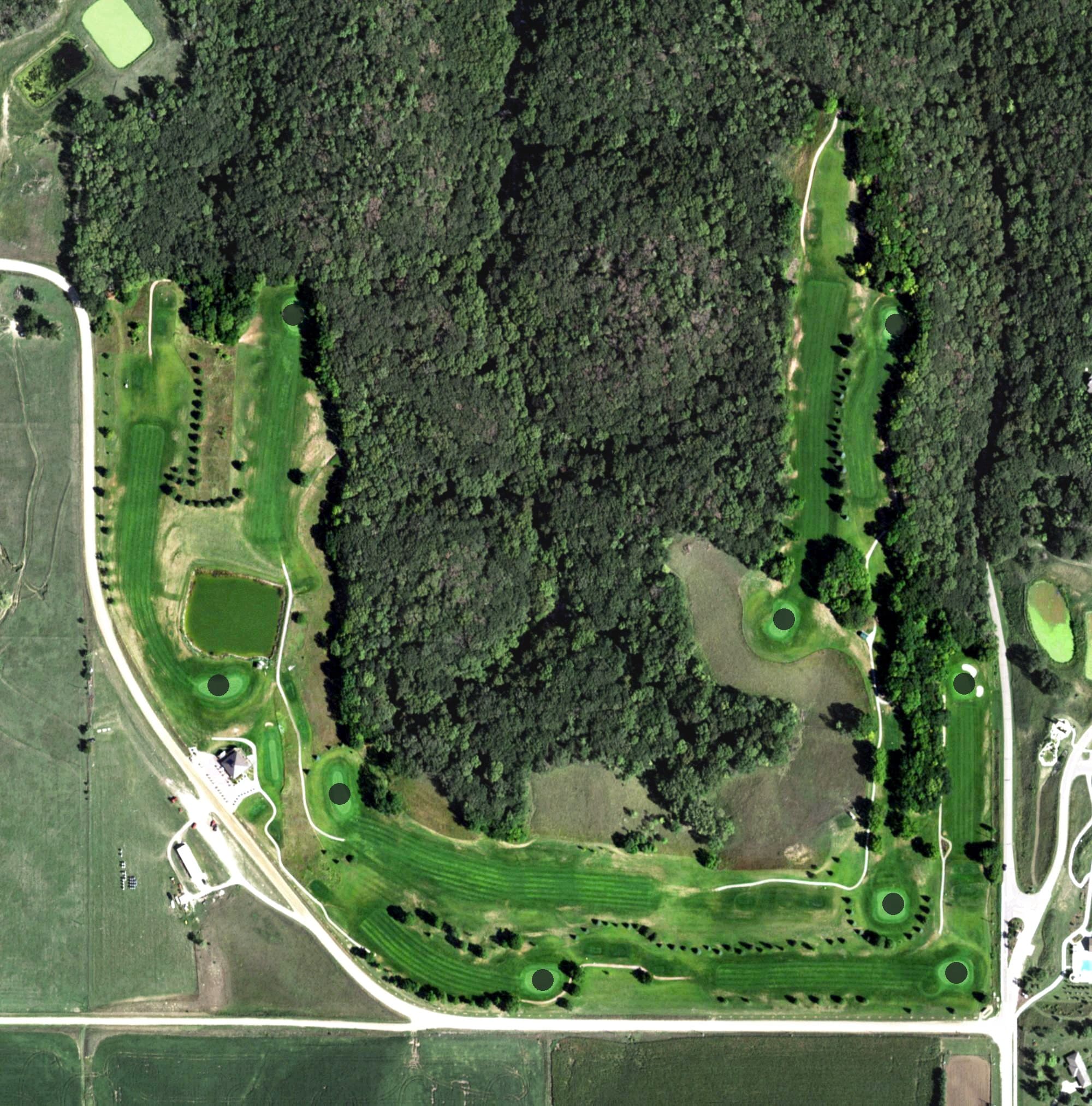 Aerial view of Highland Oaks Golf Course, NE, with its hole routing marked