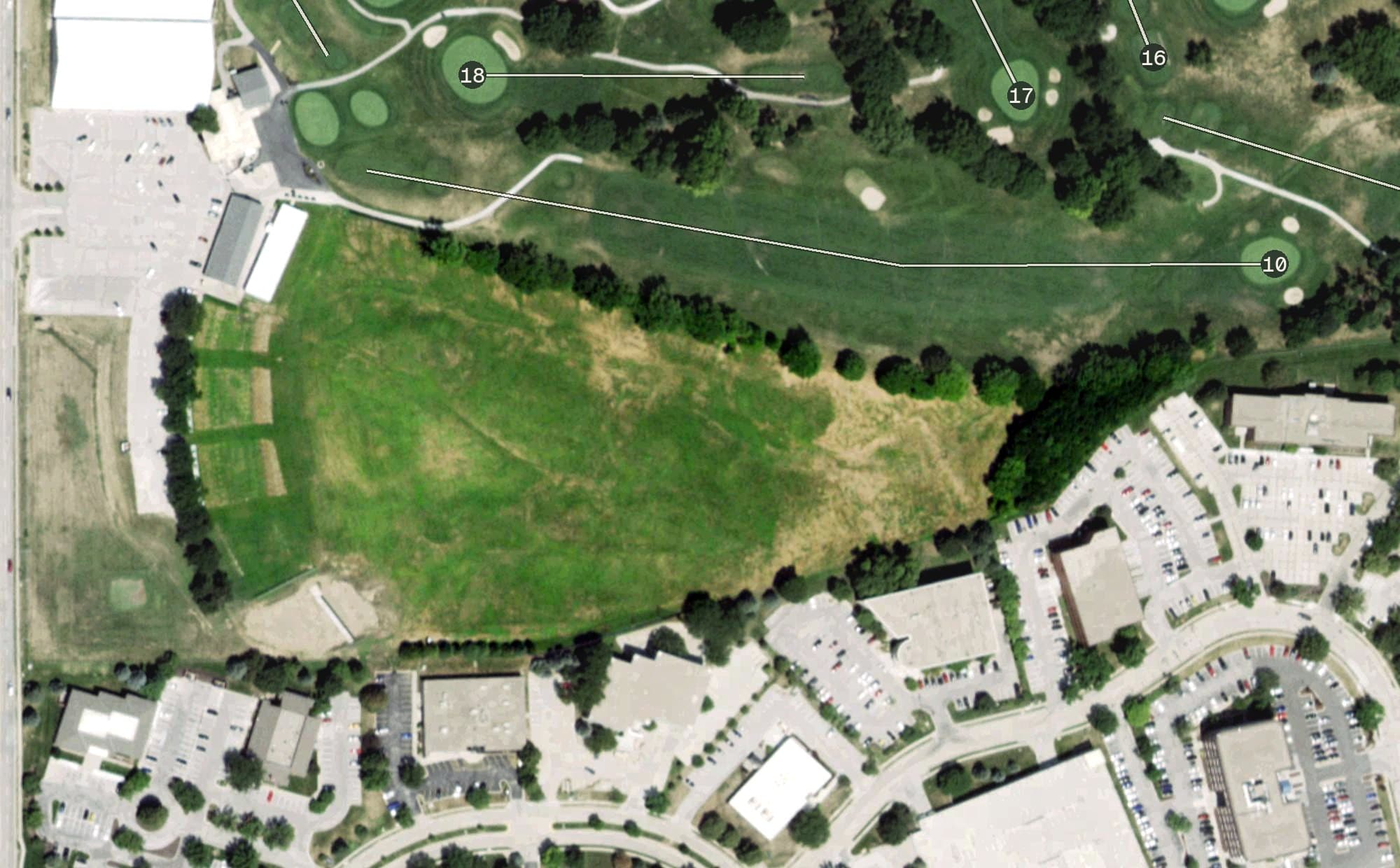 Aerial view of Miracle Hill Driving Range, NE, with its hole routing marked