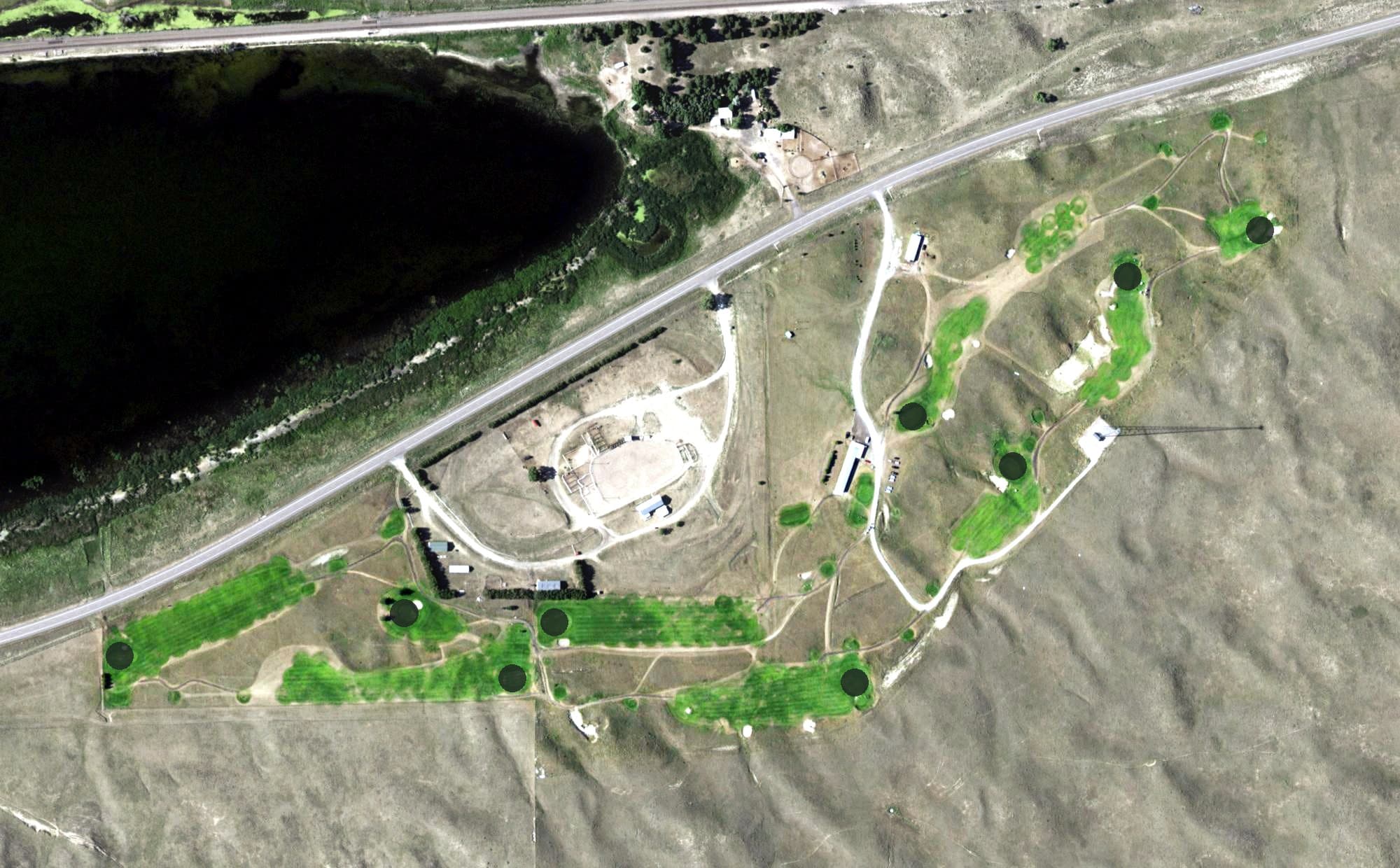 Aerial view of Pelican Beach Golf Course, NE, with its hole routing marked