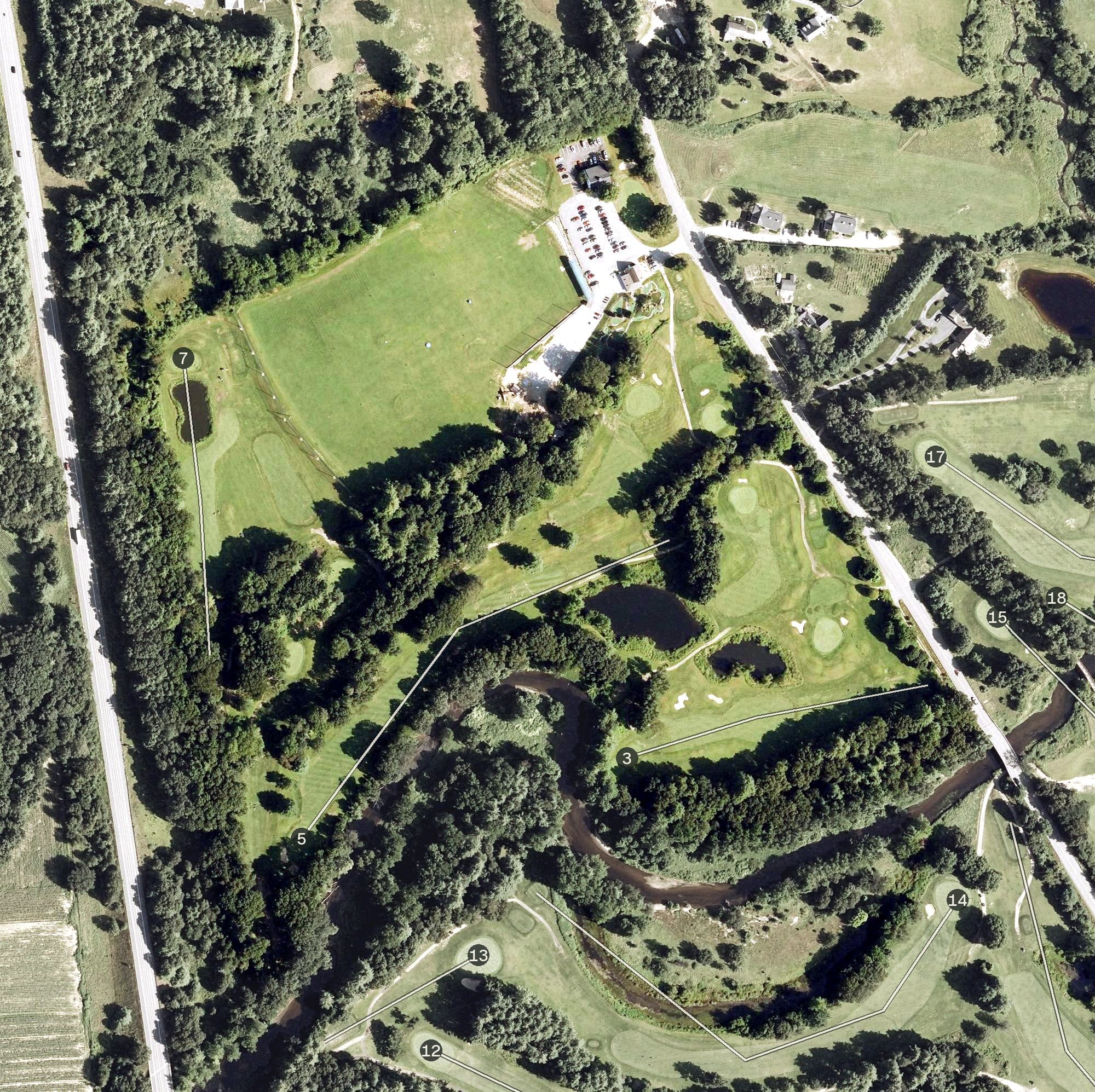 Aerial view of Ponemah Green Family Golf Center, NH, with its hole routing marked