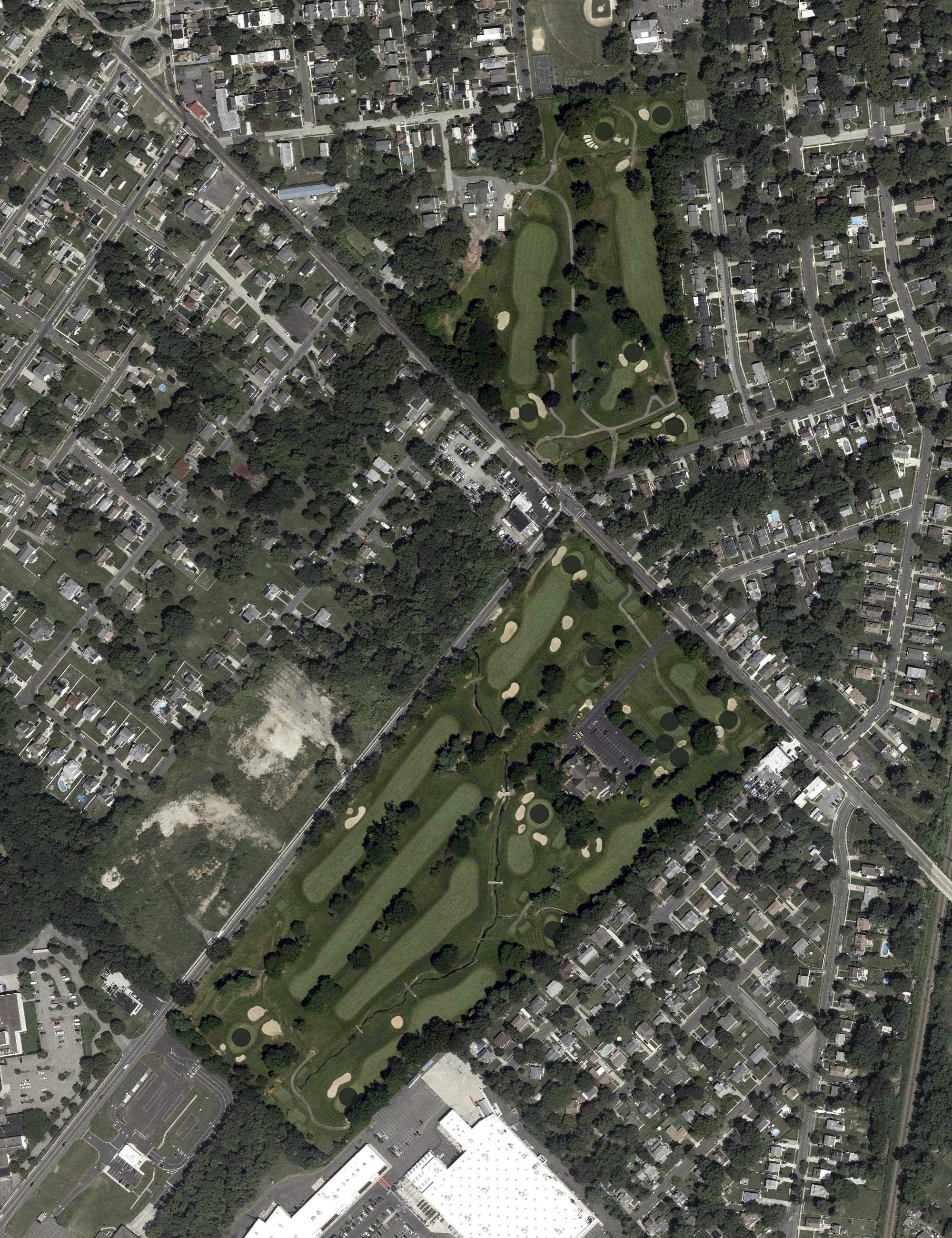 Aerial view of Merchantville Country Club, NJ, with its hole routing marked