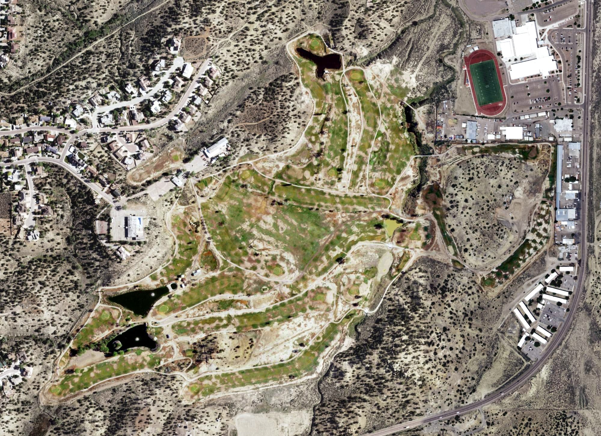 Aerial view of Fox Run Golf Course (Gallup), NM, with its hole routing marked