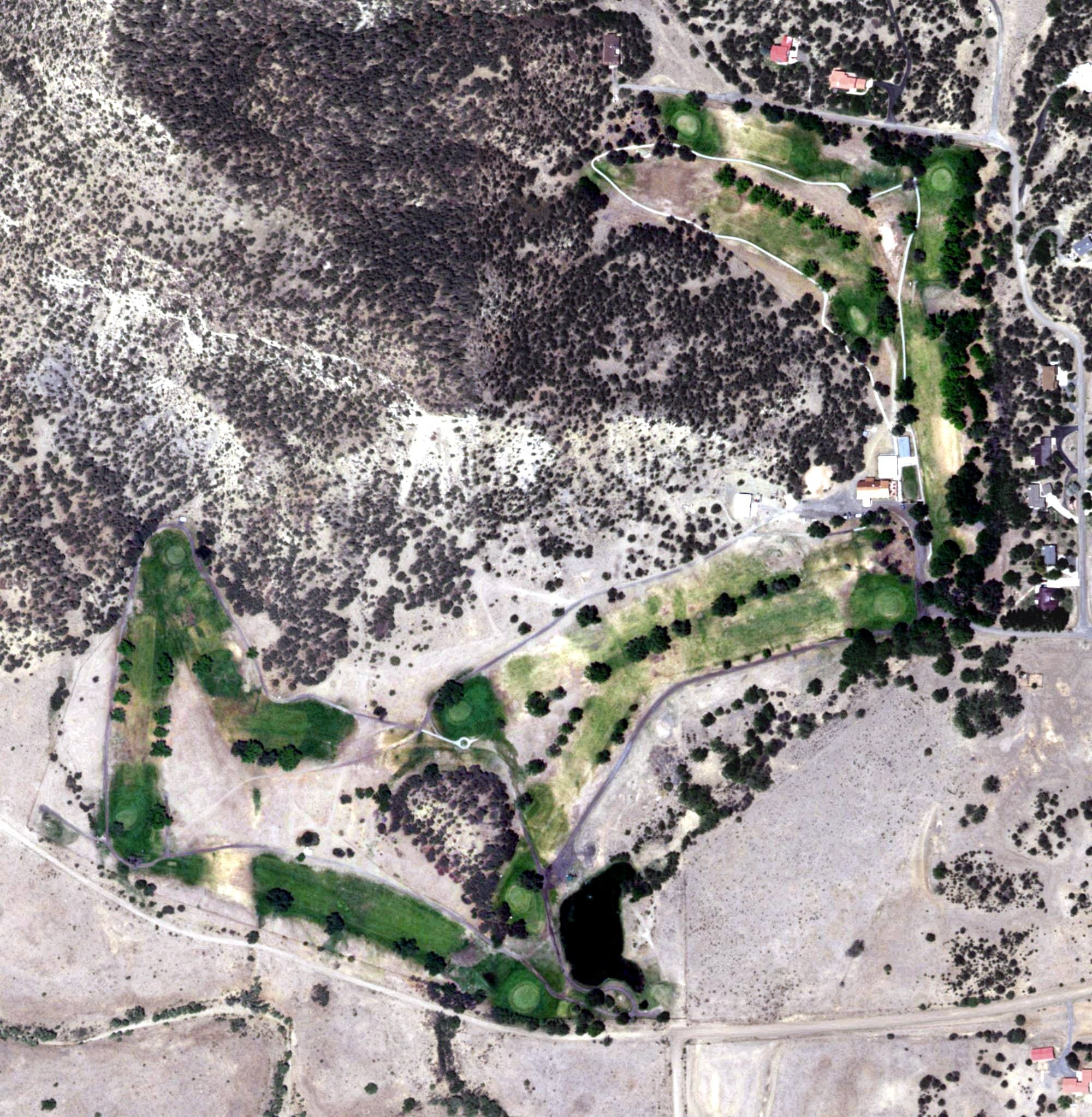 Aerial view of Raton Golf & Country Club, NM, with its hole routing marked