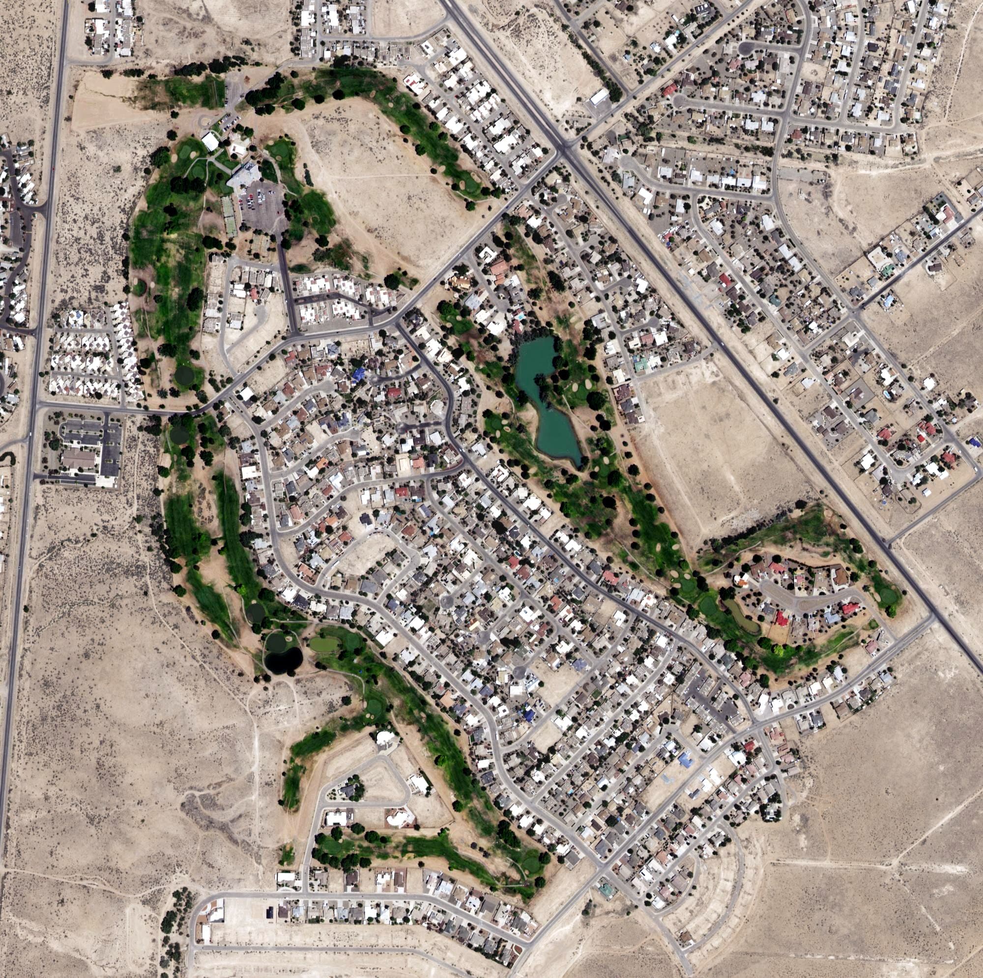 Aerial view of Tierra Del Sol Golf Club, NM, with its hole routing marked