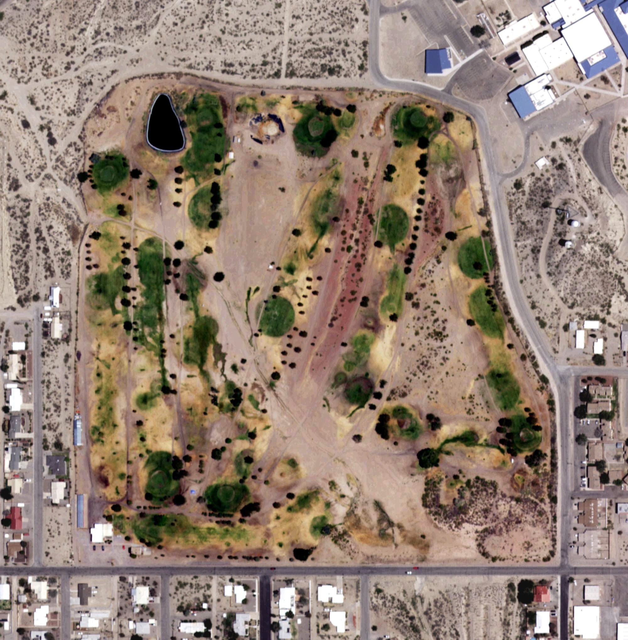 Aerial view of Truth or Consequences Municipal Golf Course, NM, with its hole routing marked