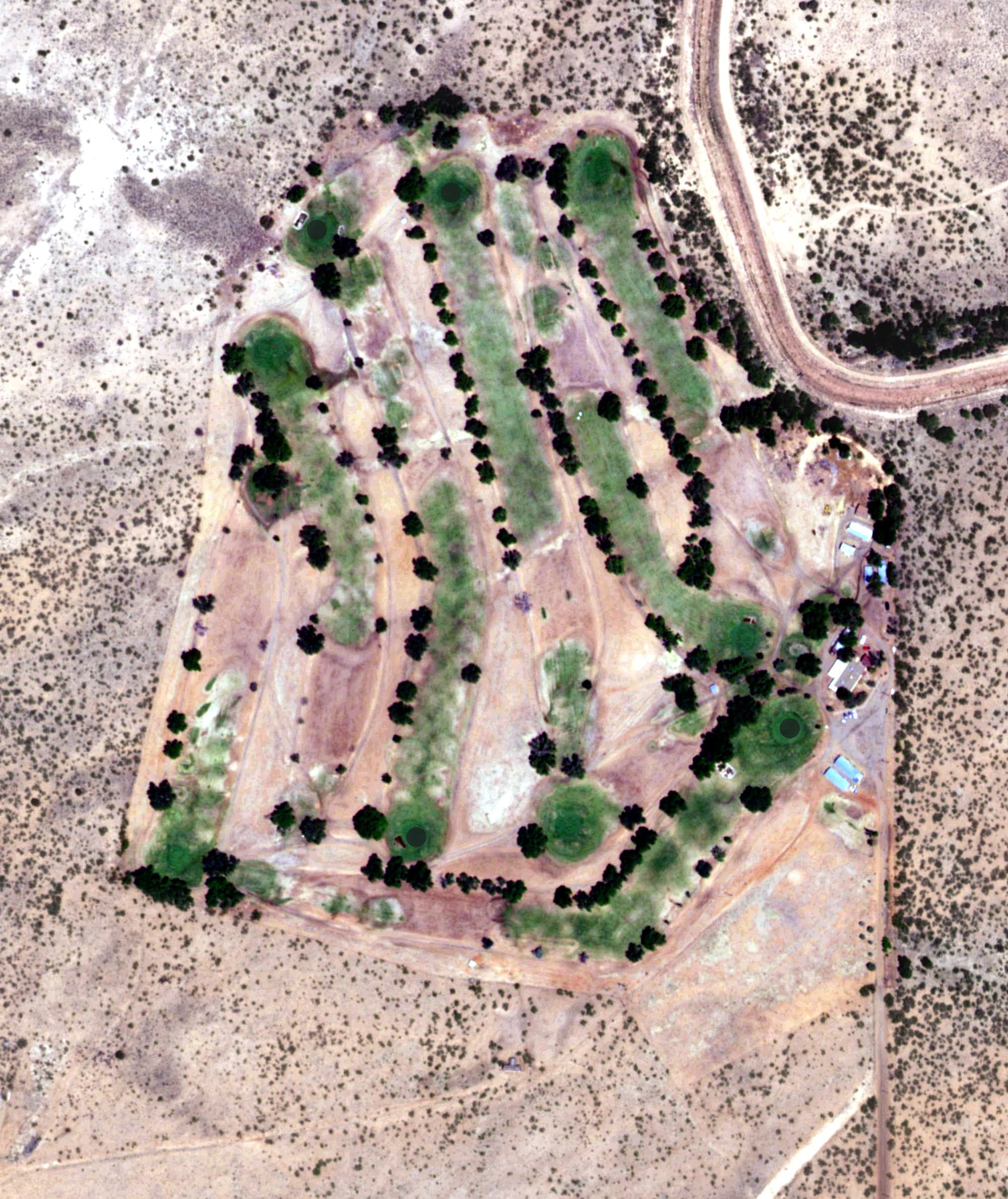 Aerial view of Tucumcari Municipal Golf Course, NM, with its hole routing marked
