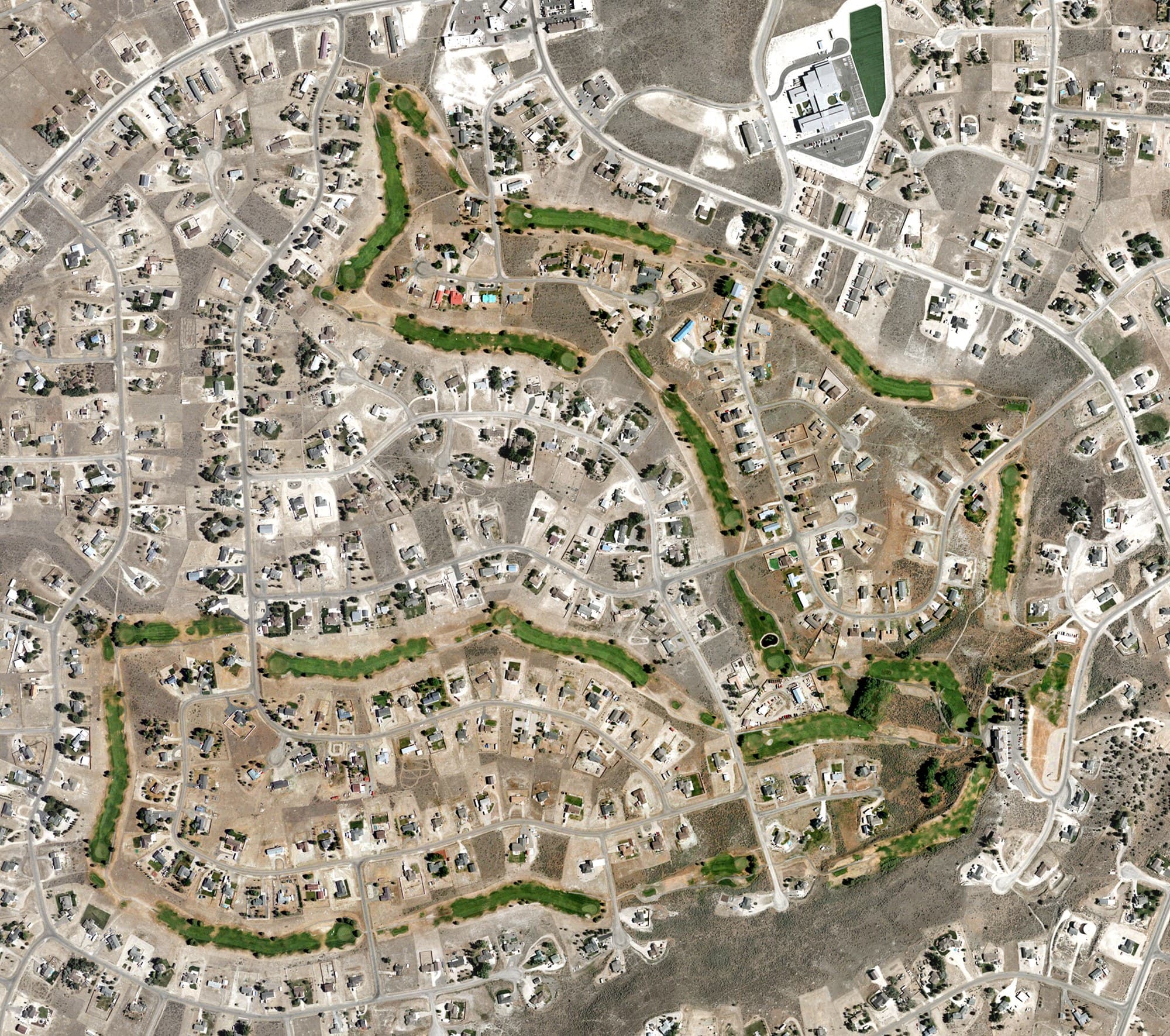 Aerial view of Spring Creek Golf Course, NV, with its hole routing marked