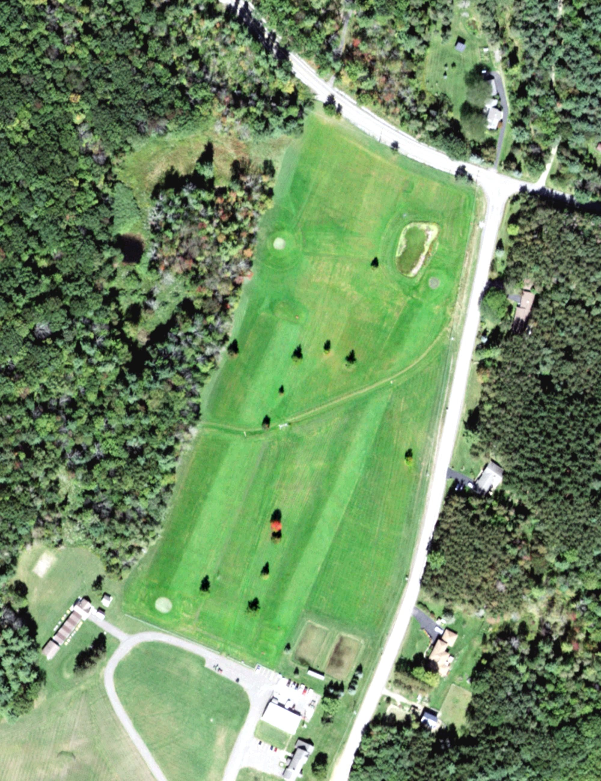 Aerial view of Harris Hill Golf Course, NY, with its hole routing marked