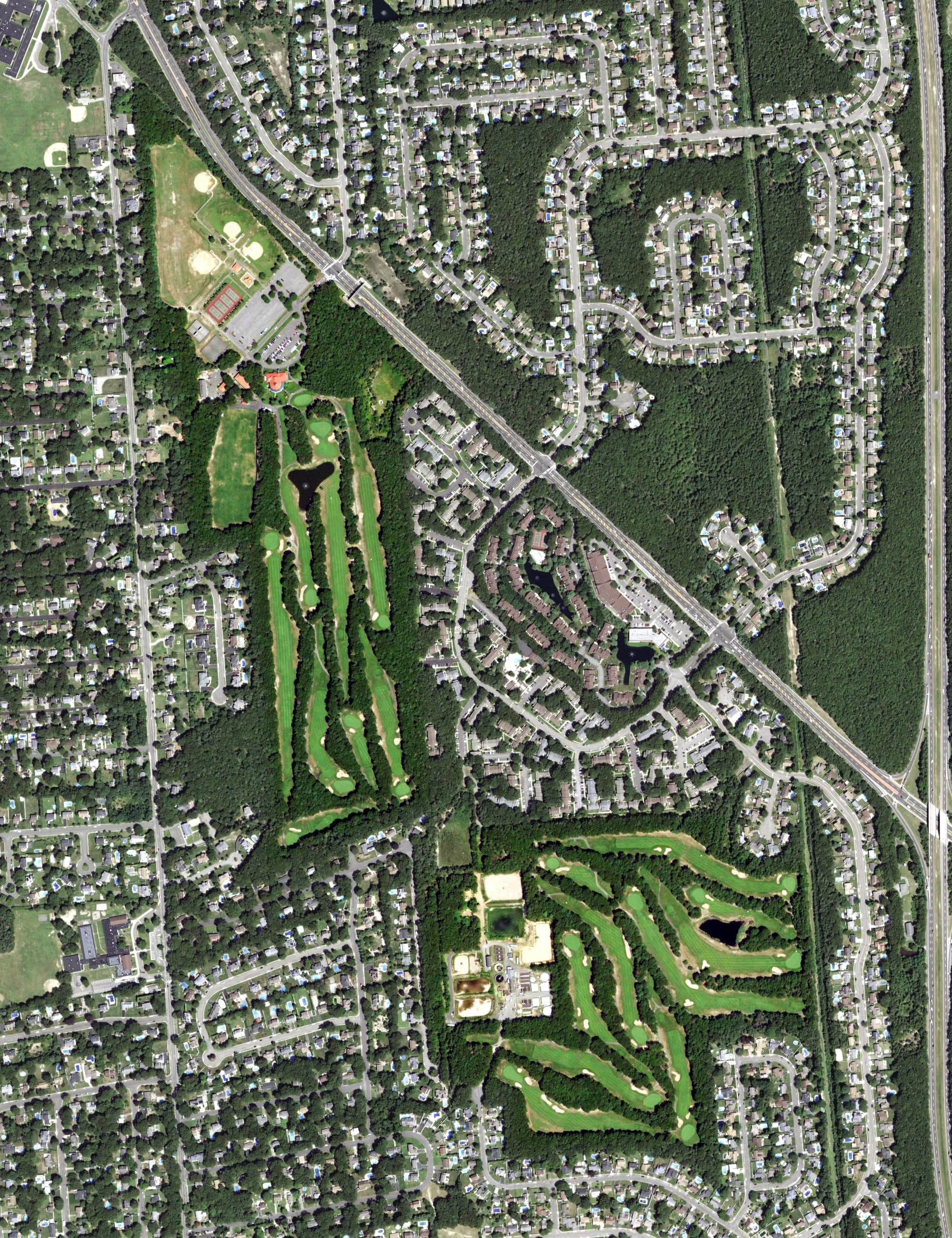 Aerial view of Holbrook Country Club, NY, with its hole routing marked