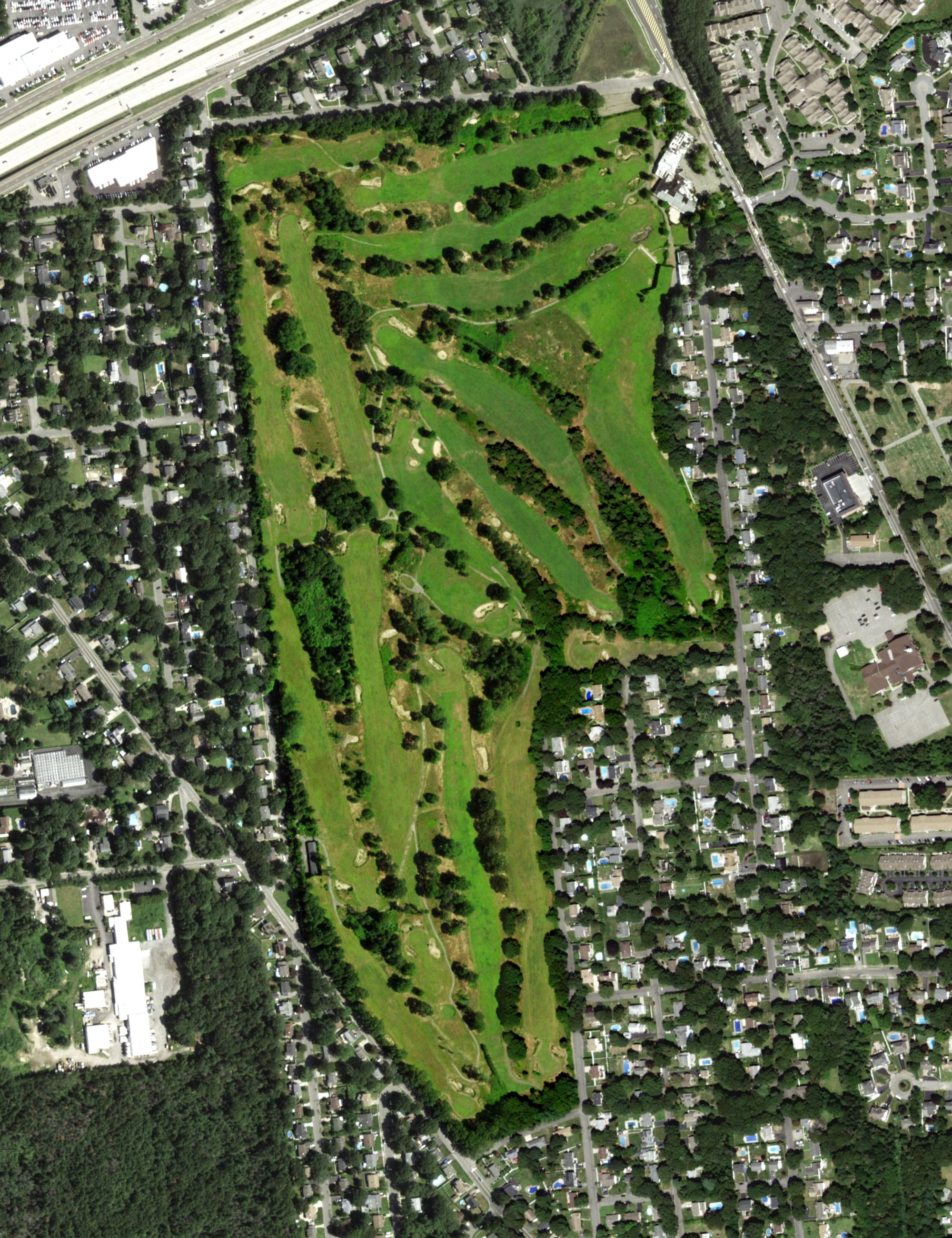 Aerial view of Island Hills Country Club, NY, with its hole routing marked