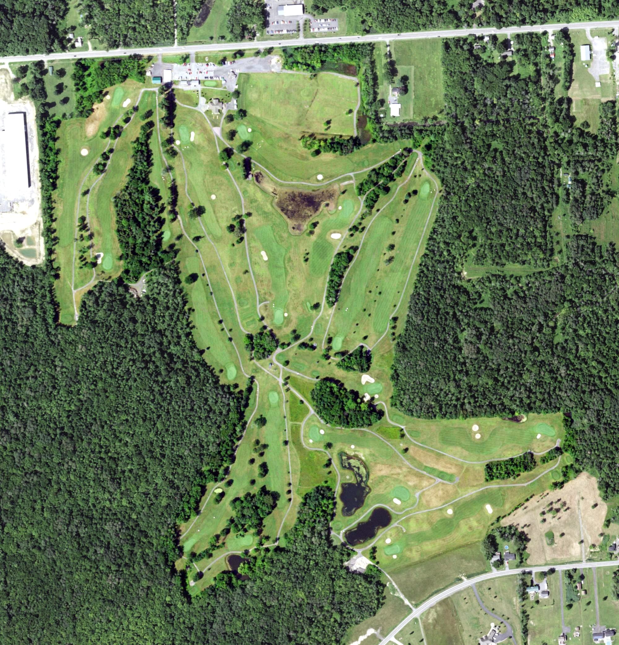 Aerial view of Northern Pines Golf Club, NY, with its hole routing marked