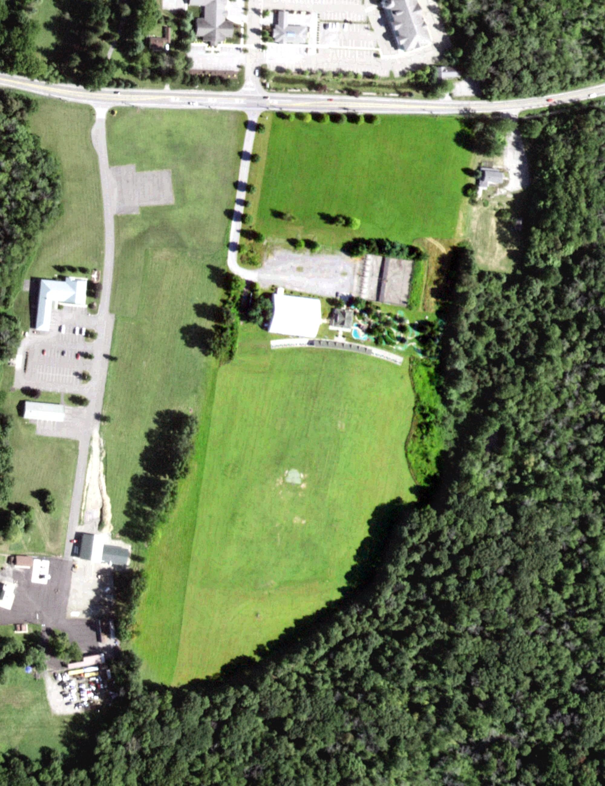 Aerial view of Par Fore Golf Center, NY, with its hole routing marked