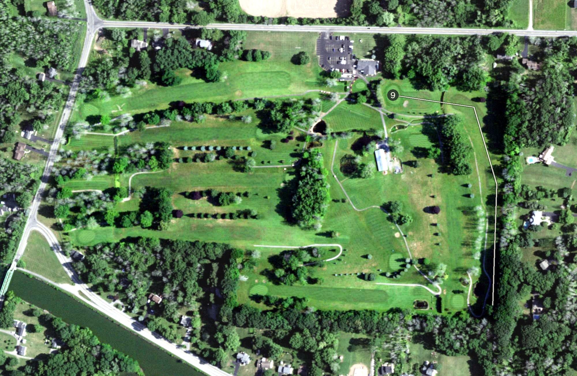 Aerial view of Pinewood Country Club, NY, with its hole routing marked