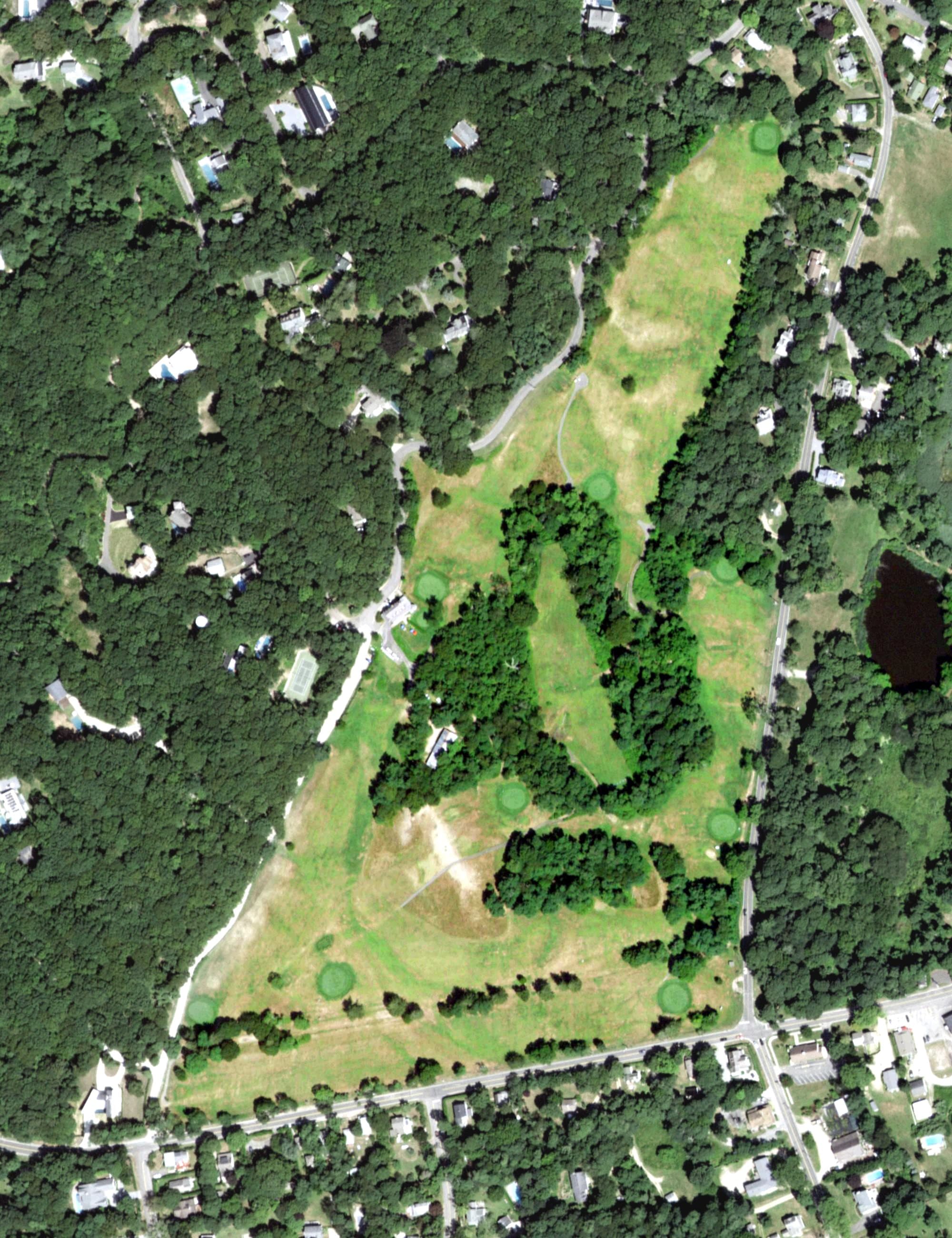 Aerial view of Shelter Island Country Club, NY, with its hole routing marked