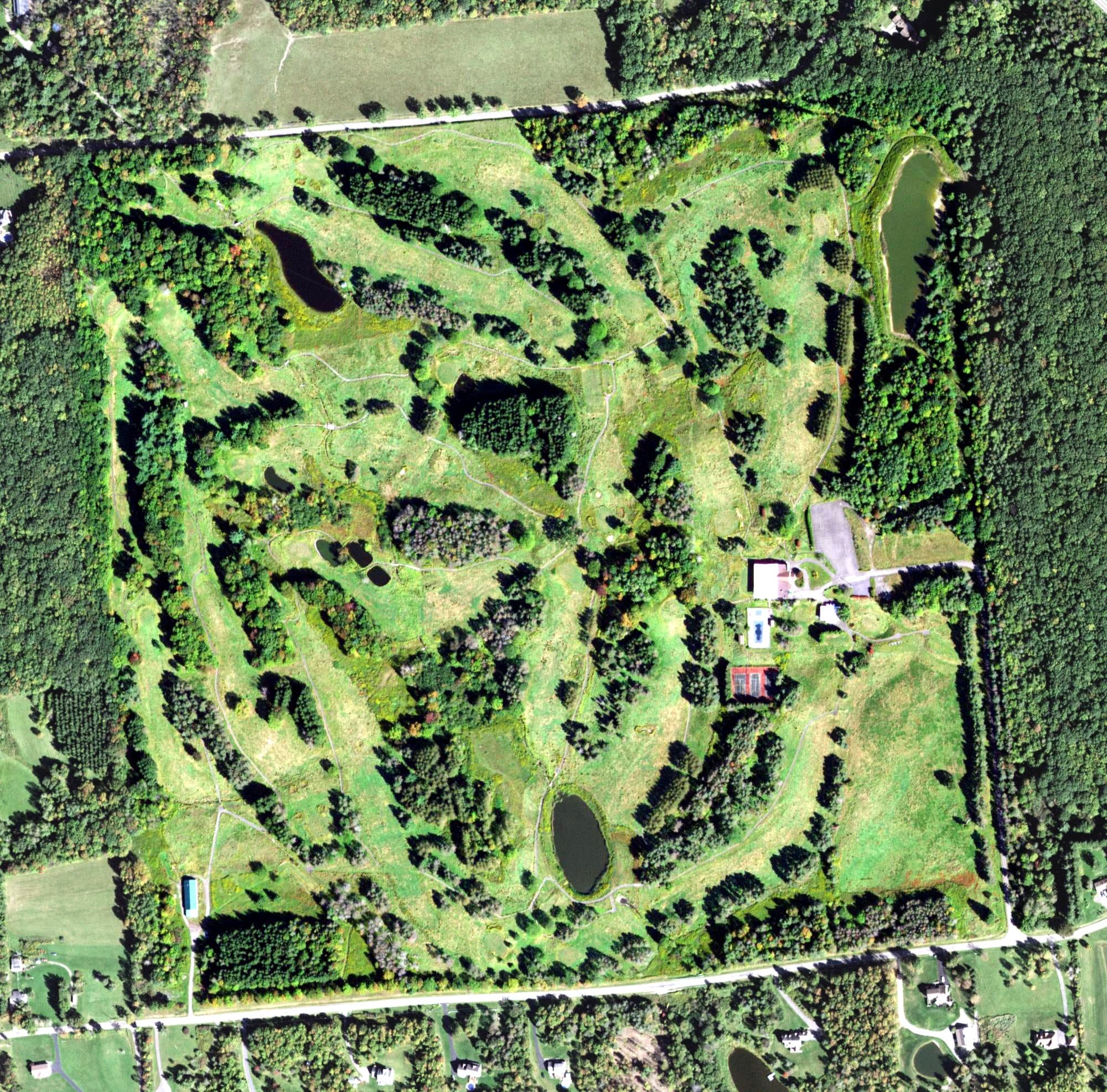 Aerial view of Vestal Hills Country Club, NY, with its hole routing marked