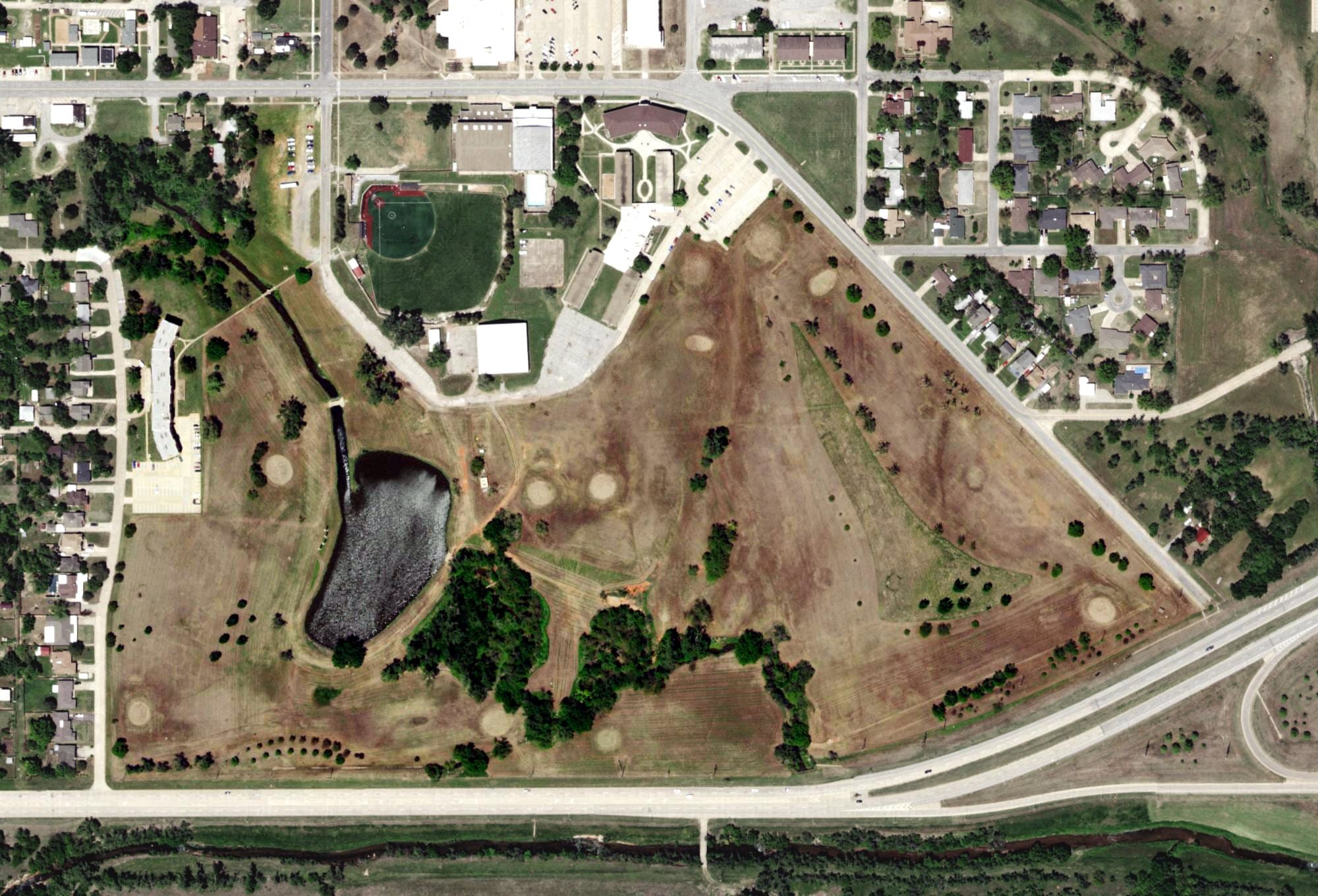 Aerial view of Northern Hills Golf Course, OK, with its hole routing marked