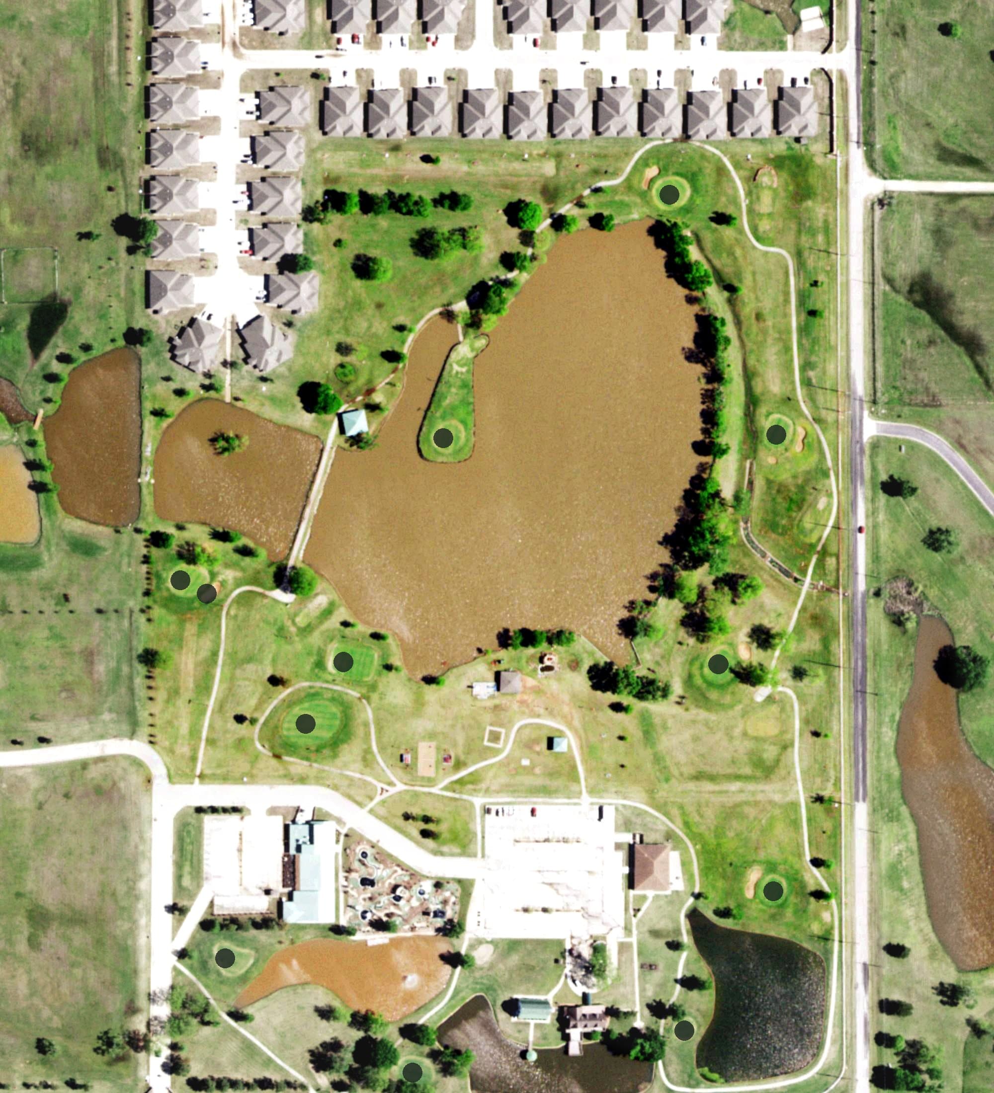 Aerial view of White Barn Par 3 Golf, OK, with its hole routing marked