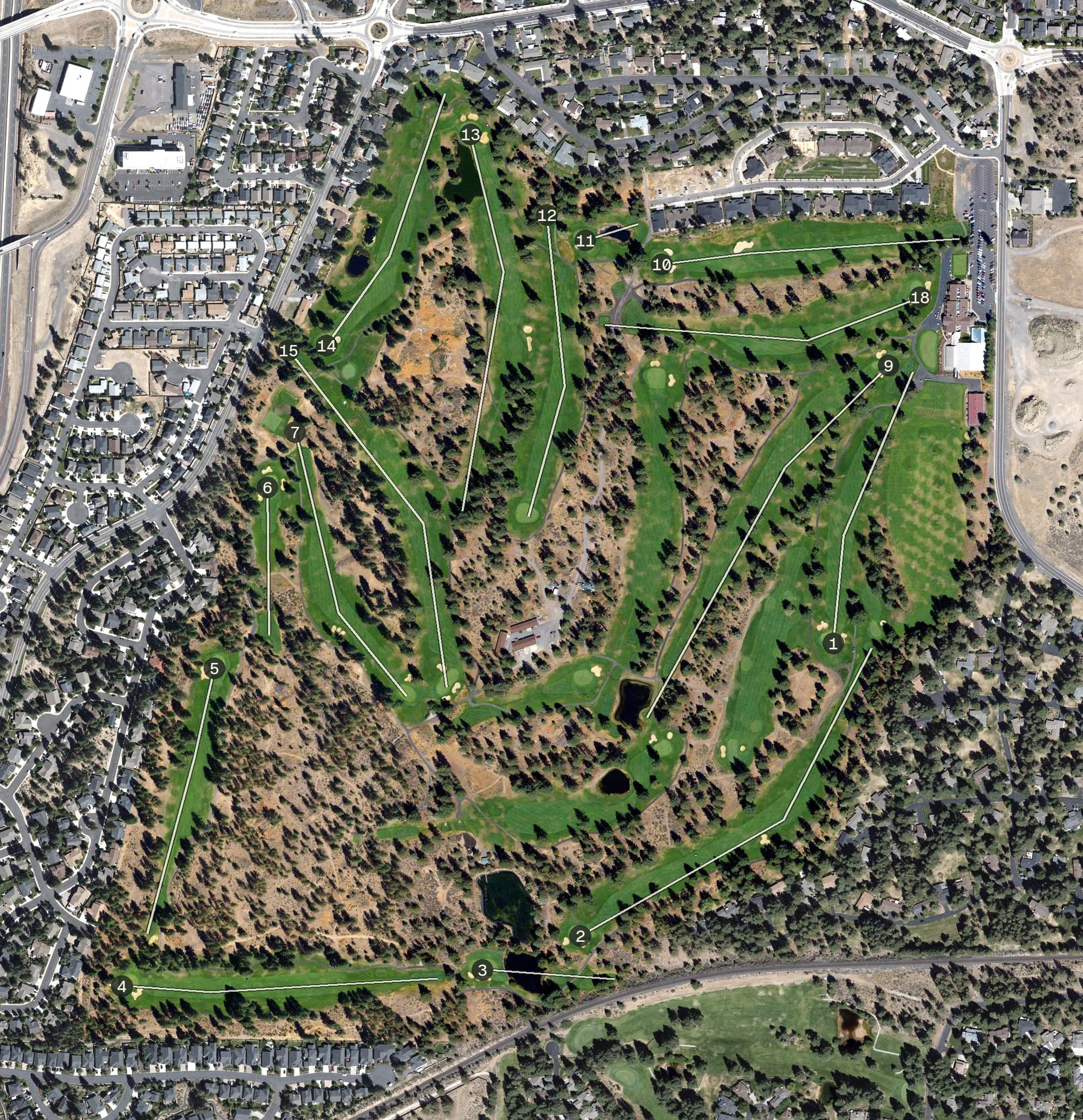 Aerial view of Bend Golf & Country Club, OR, with its hole routing marked