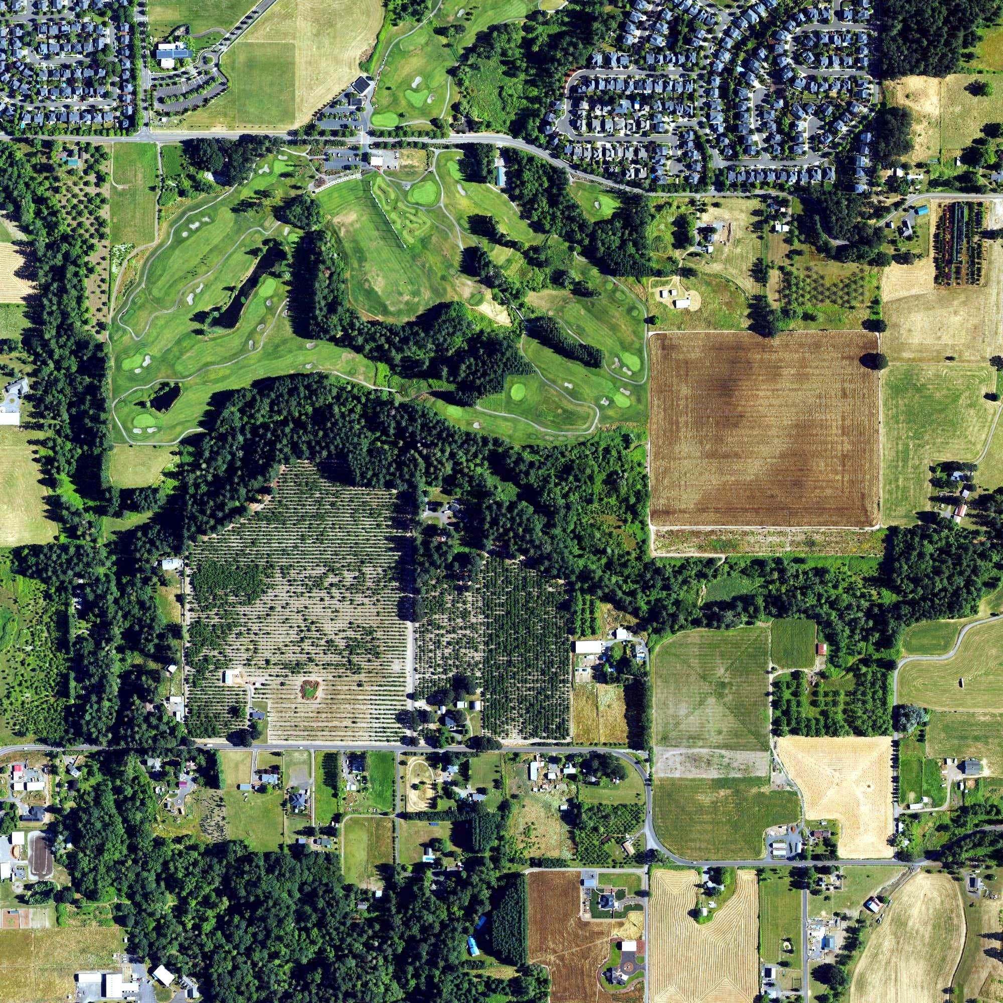 Aerial view of Chehalem Glenn Golf Course, OR, with its hole routing marked