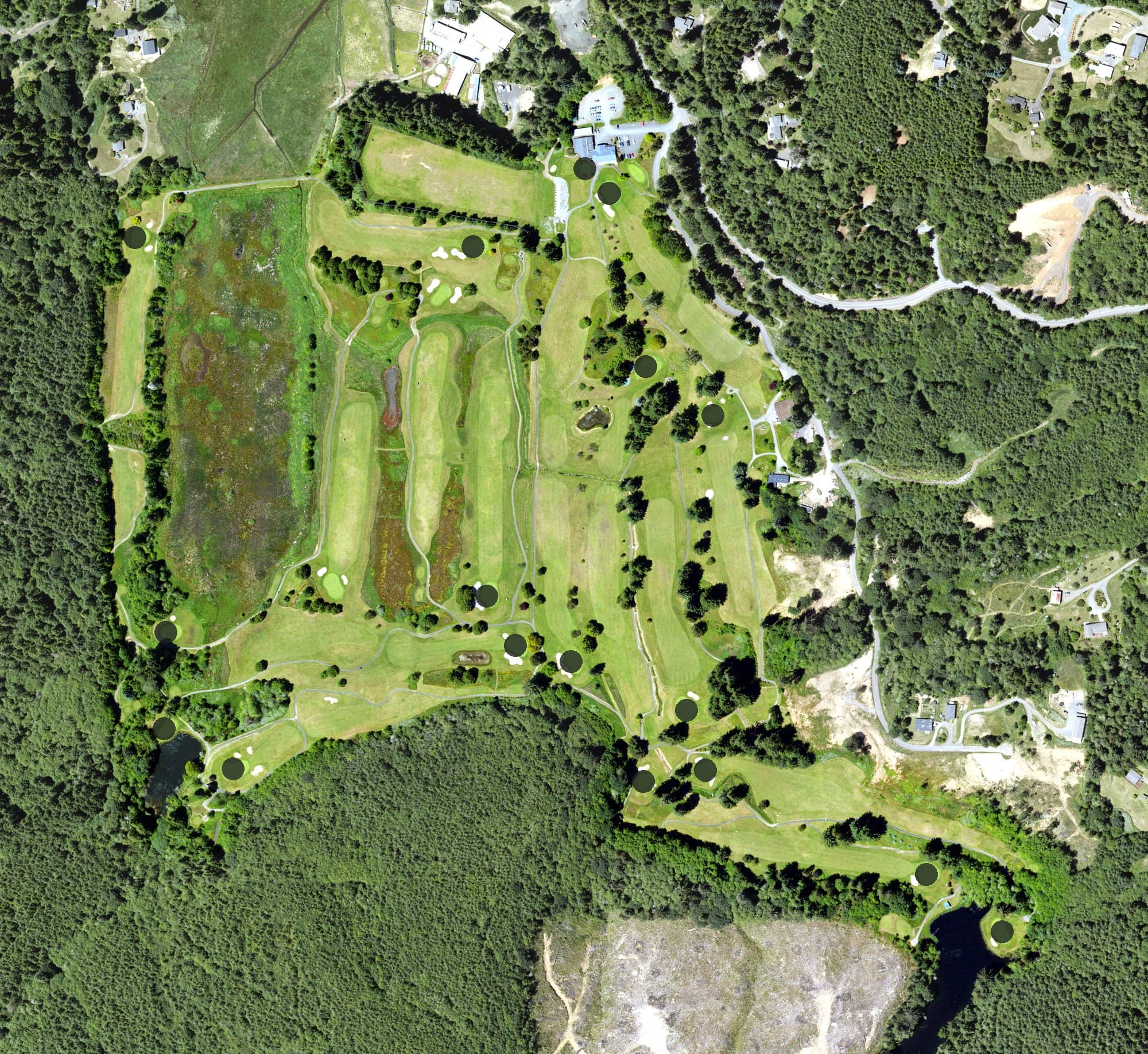 Aerial view of Coos Golf Club, OR, with its hole routing marked