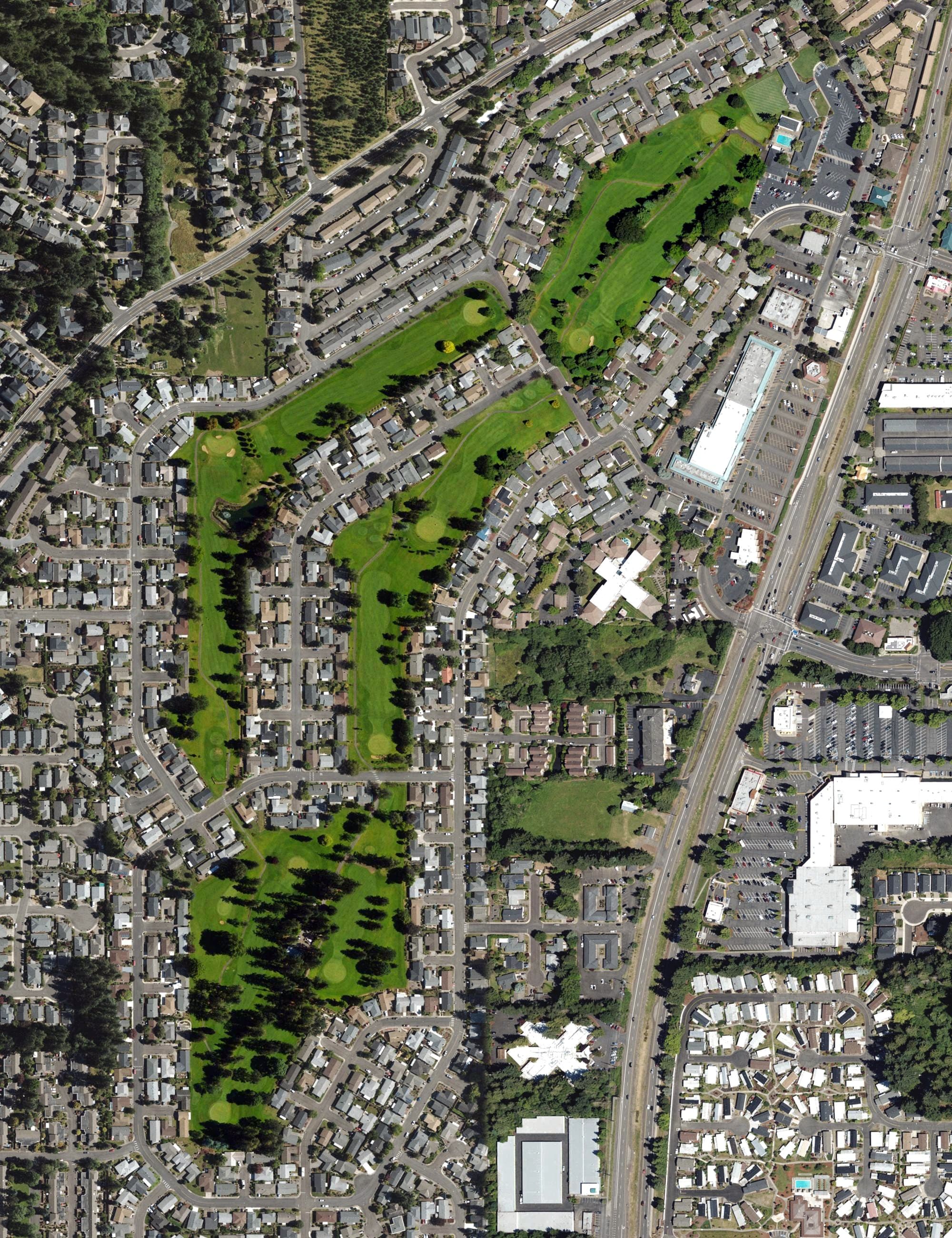 Aerial view of King City Golf Course, OR, with its hole routing marked