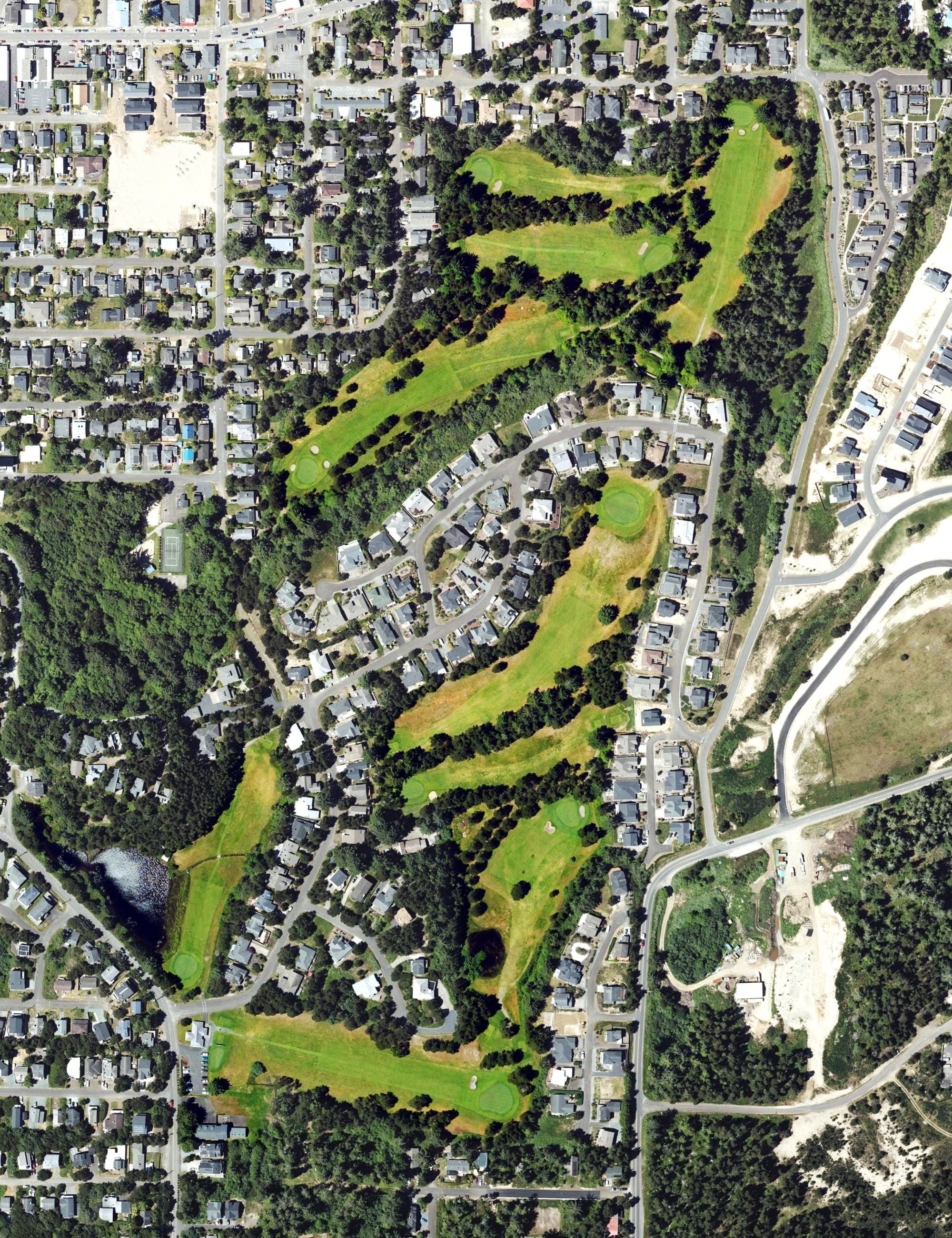 Aerial view of Manzanita Golf Course, OR, with its hole routing marked