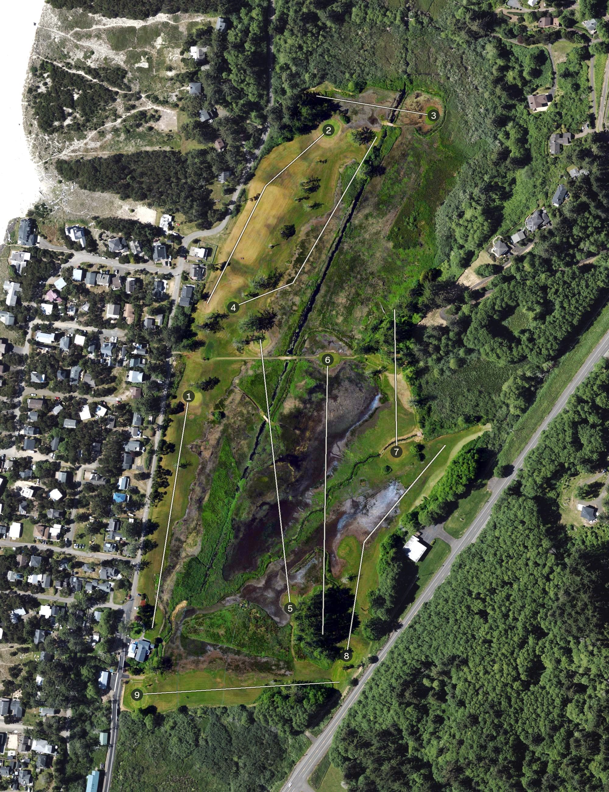 Aerial view of Neskowin Beach Golf Course, OR, with its hole routing marked