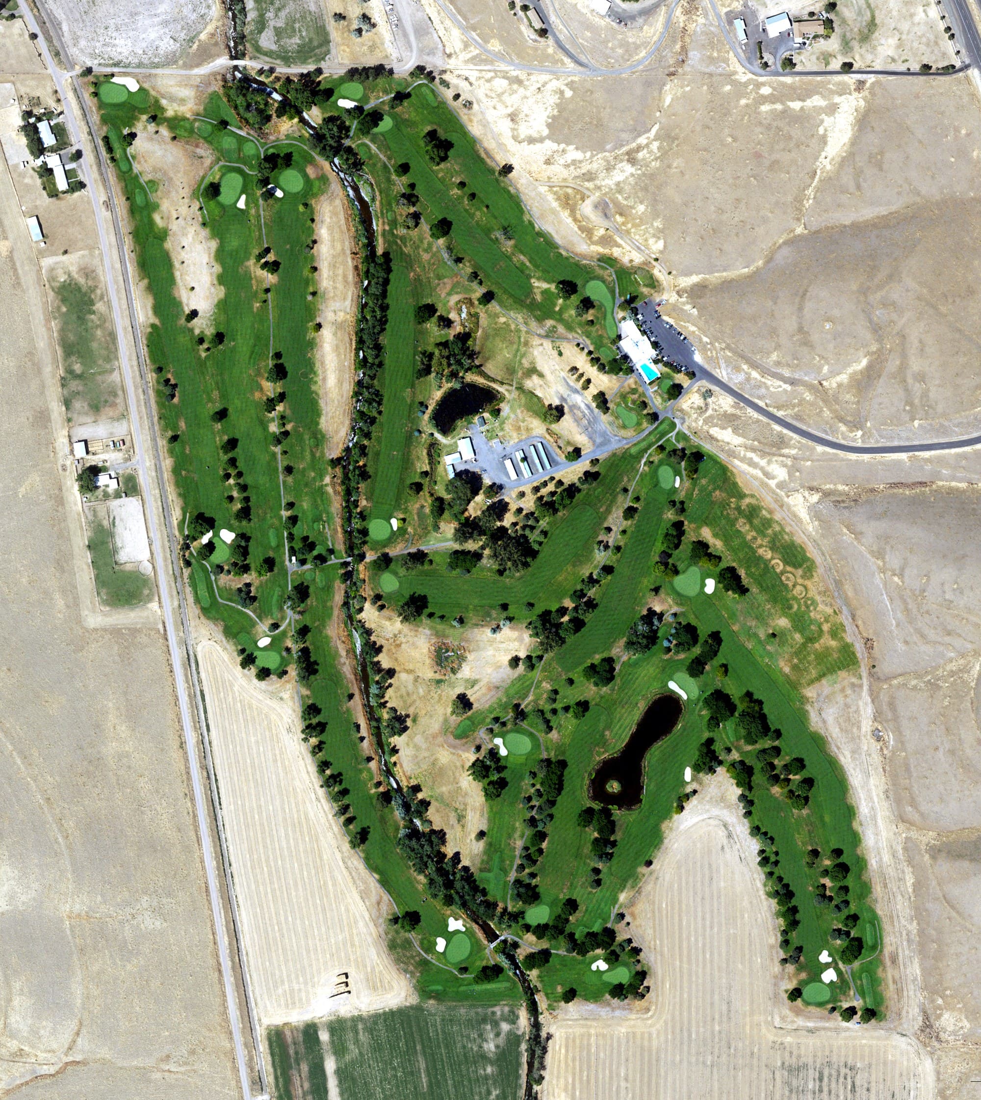 Aerial view of Pendleton Country Club, OR, with its hole routing marked