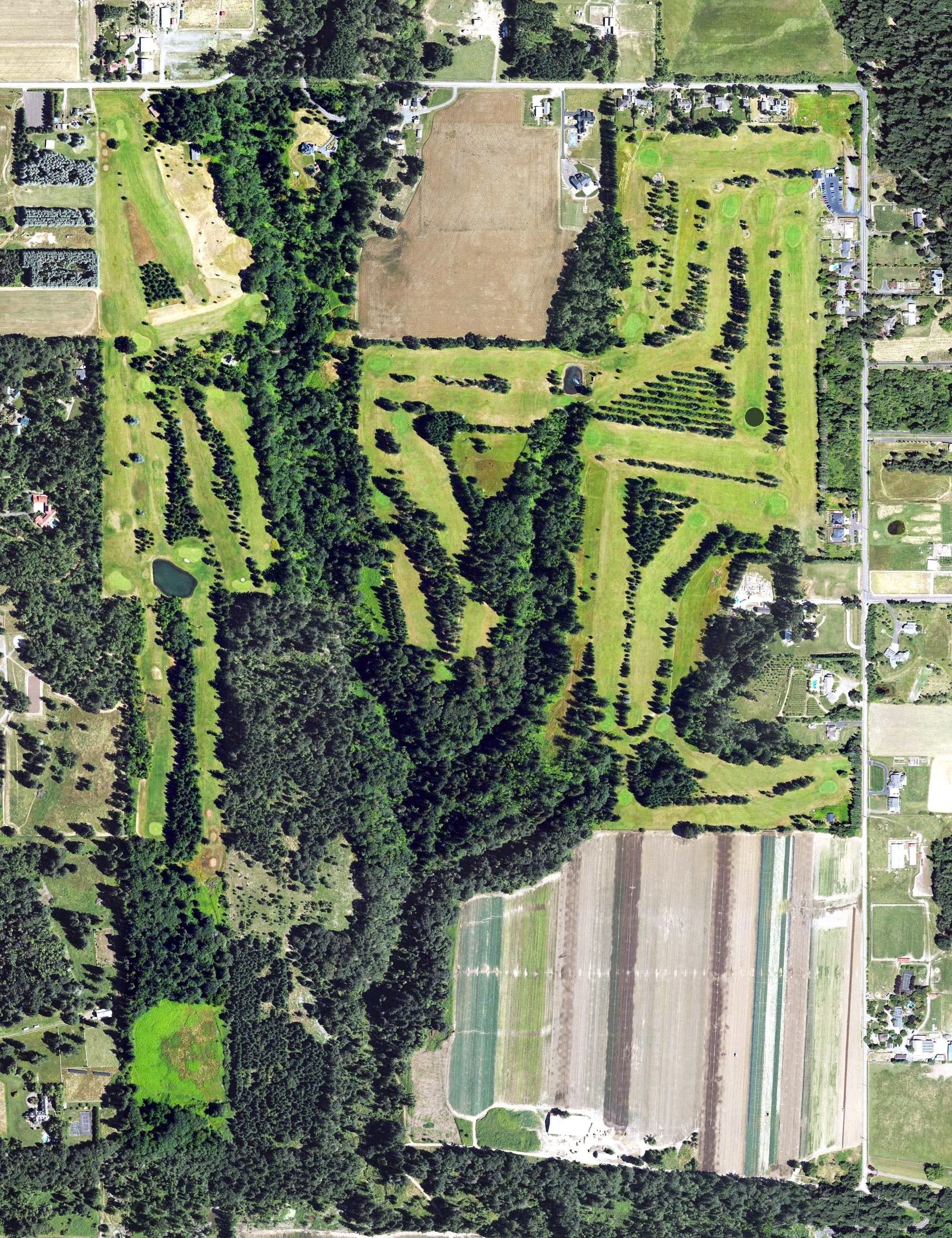 Aerial view of Sandelie Golf Course, OR, with its hole routing marked