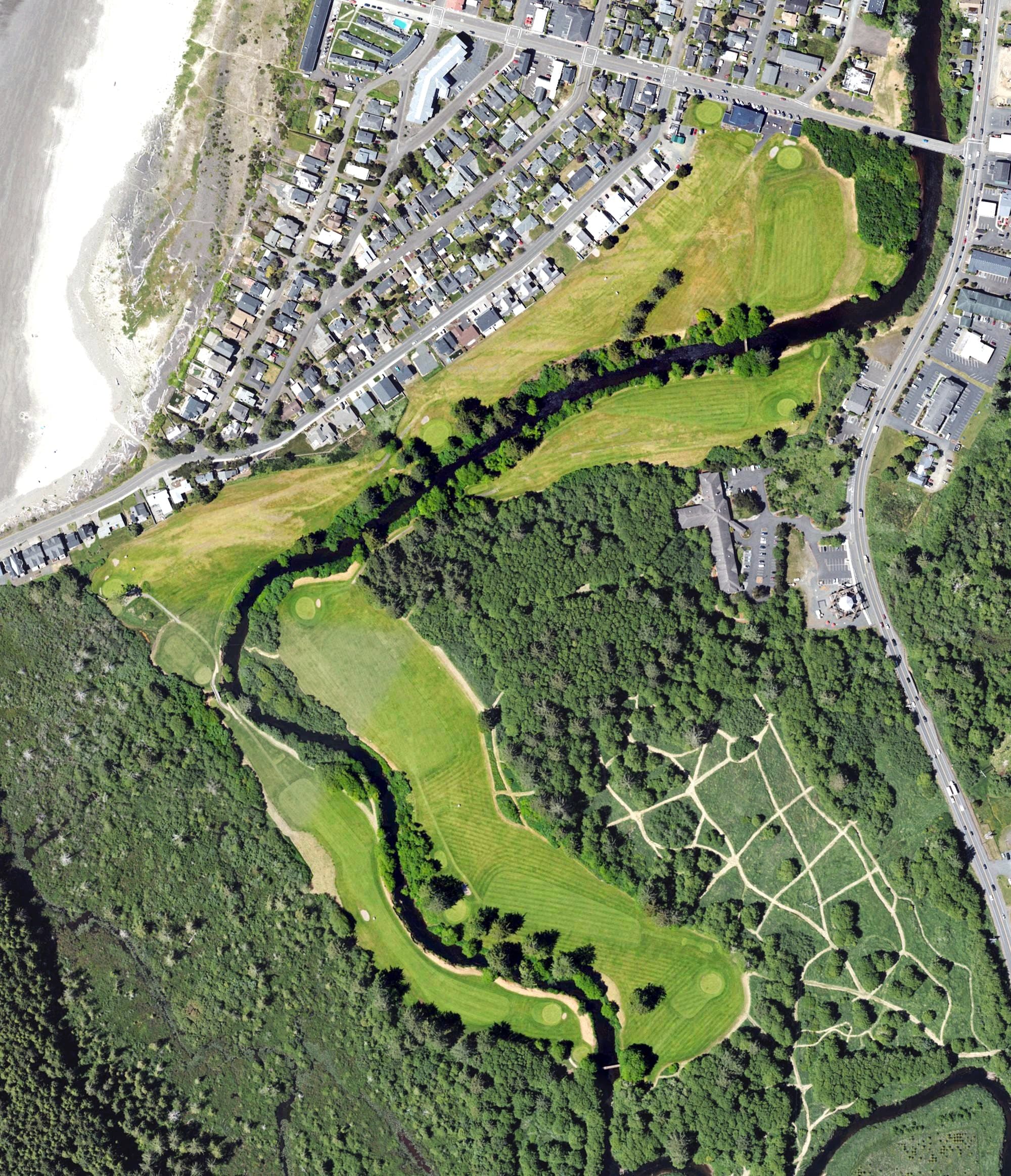 Aerial view of Seaside Golf Club, OR, with its hole routing marked