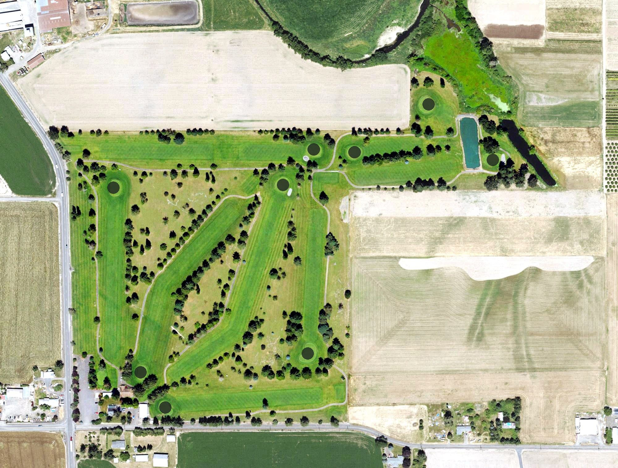 Aerial view of Sunset Grove Golf Club, OR, with its hole routing marked