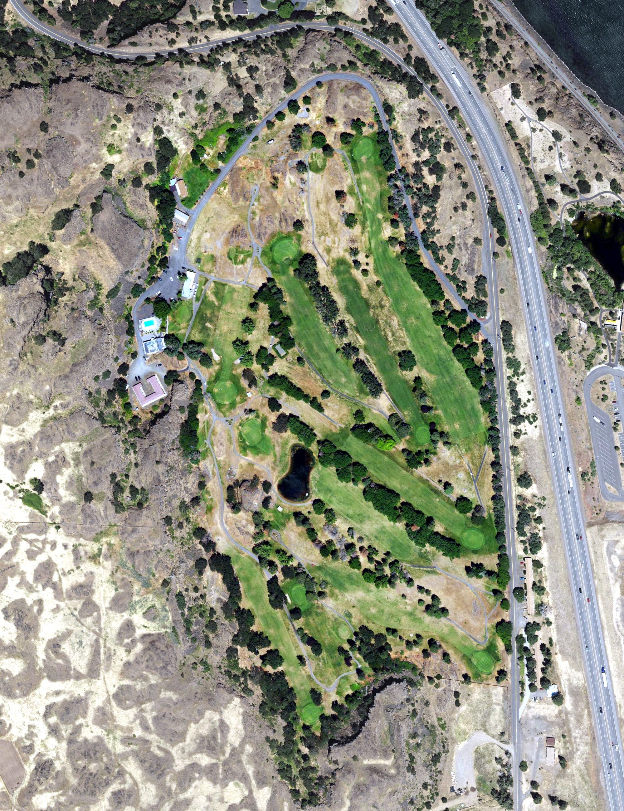 Aerial view of The Dalles Country Club, OR, with its hole routing marked