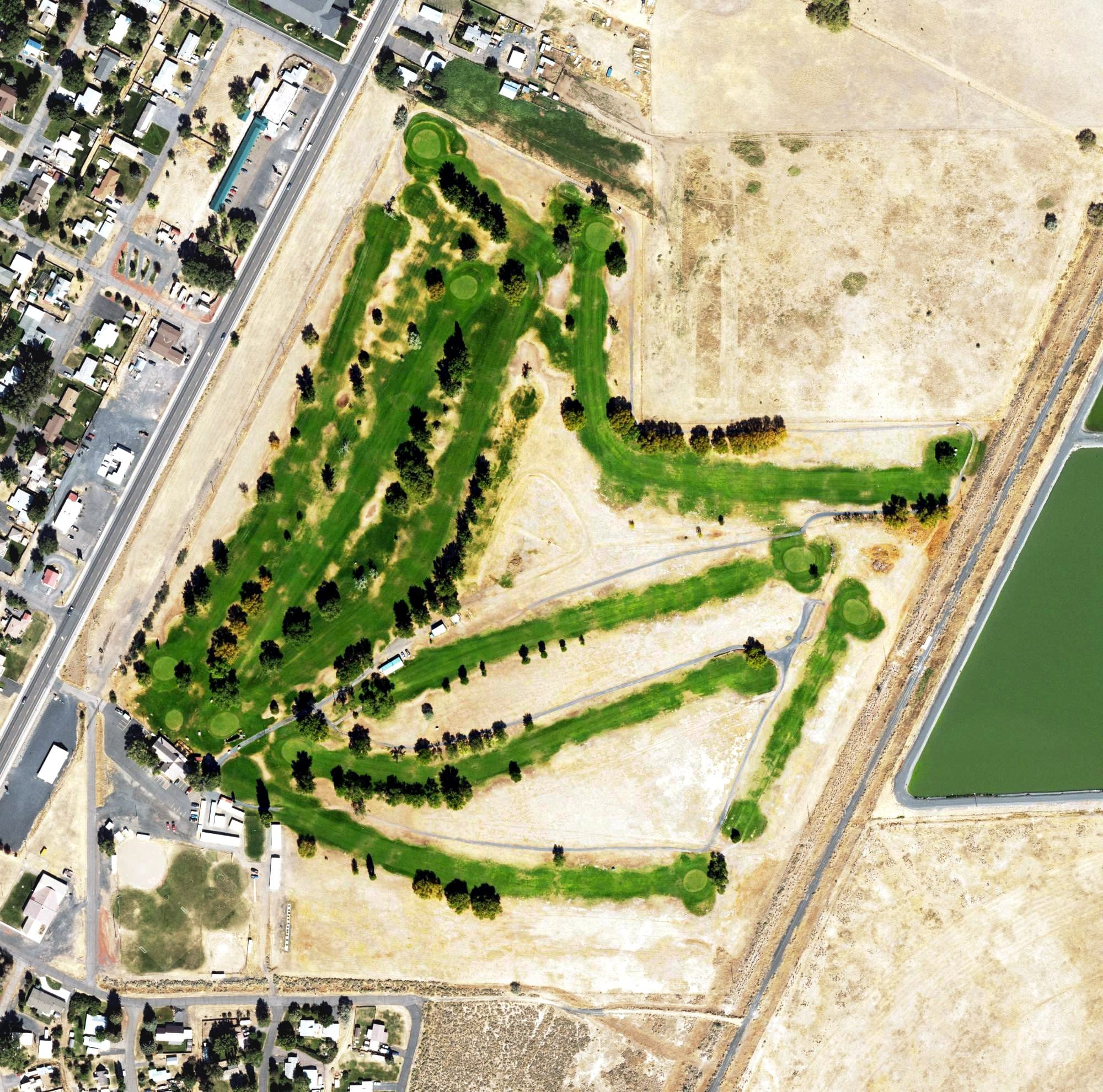 Aerial view of Valley Golf Club, OR, with its hole routing marked