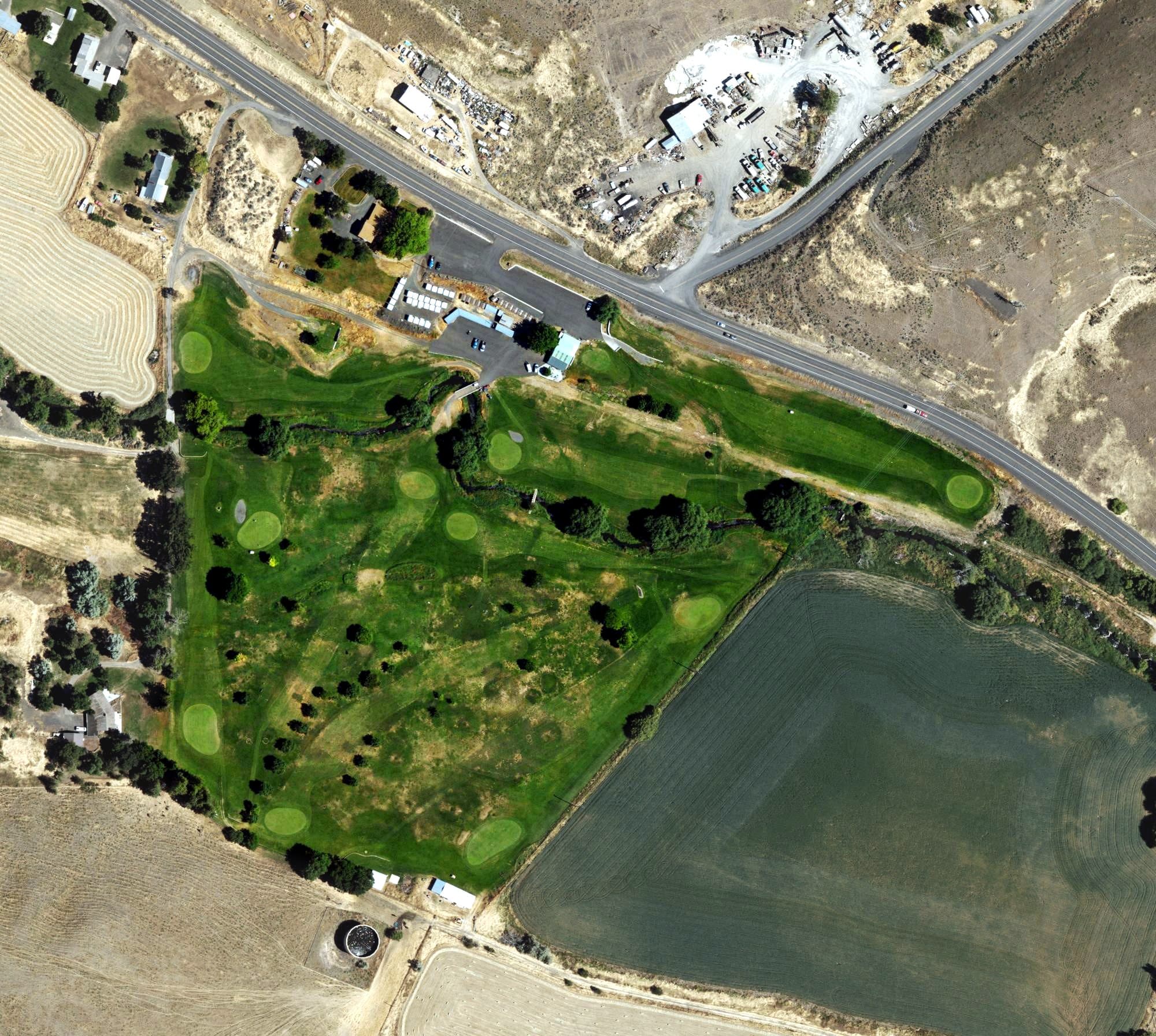 Aerial view of Willow Creek Country Club, OR, with its hole routing marked