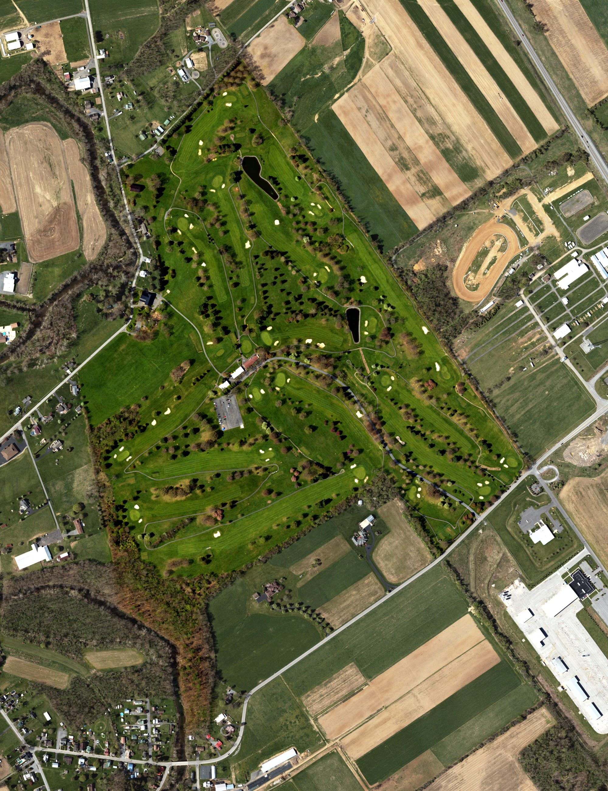 Aerial view of Belles Springs Golf Course, PA, with its hole routing marked