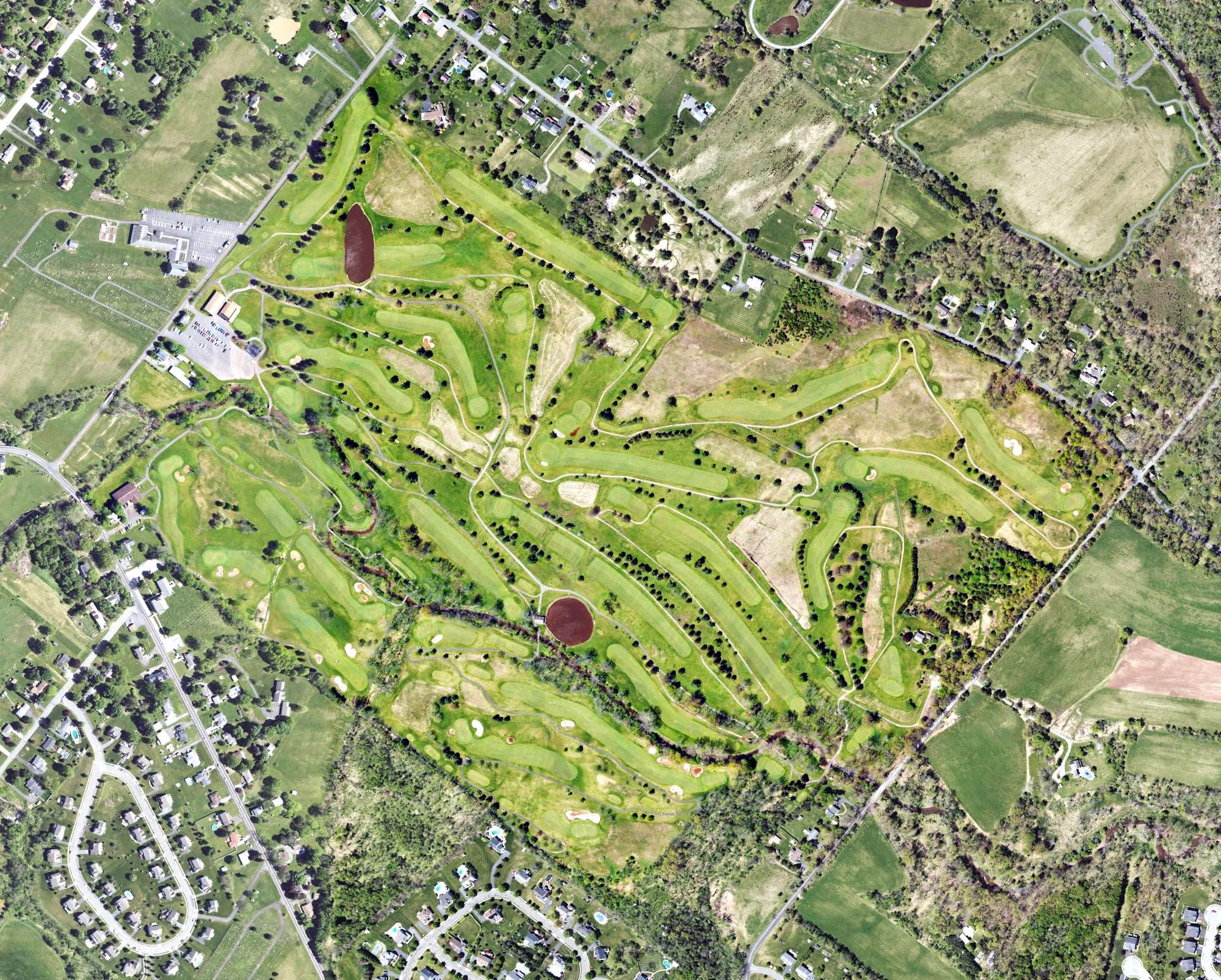 Aerial view of Gilbertsville Golf Course, PA, with its hole routing marked