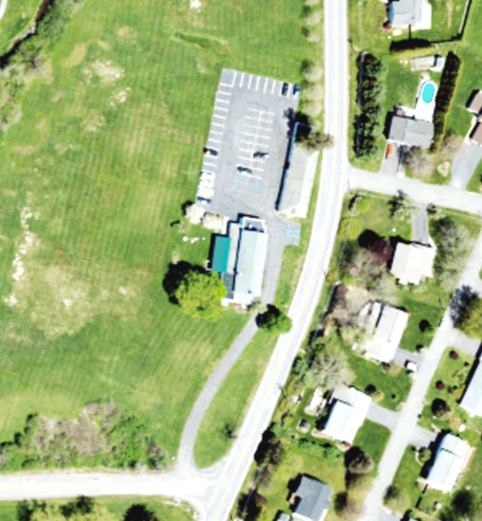 Aerial view of Waverly Country Club, PA, with its hole routing marked